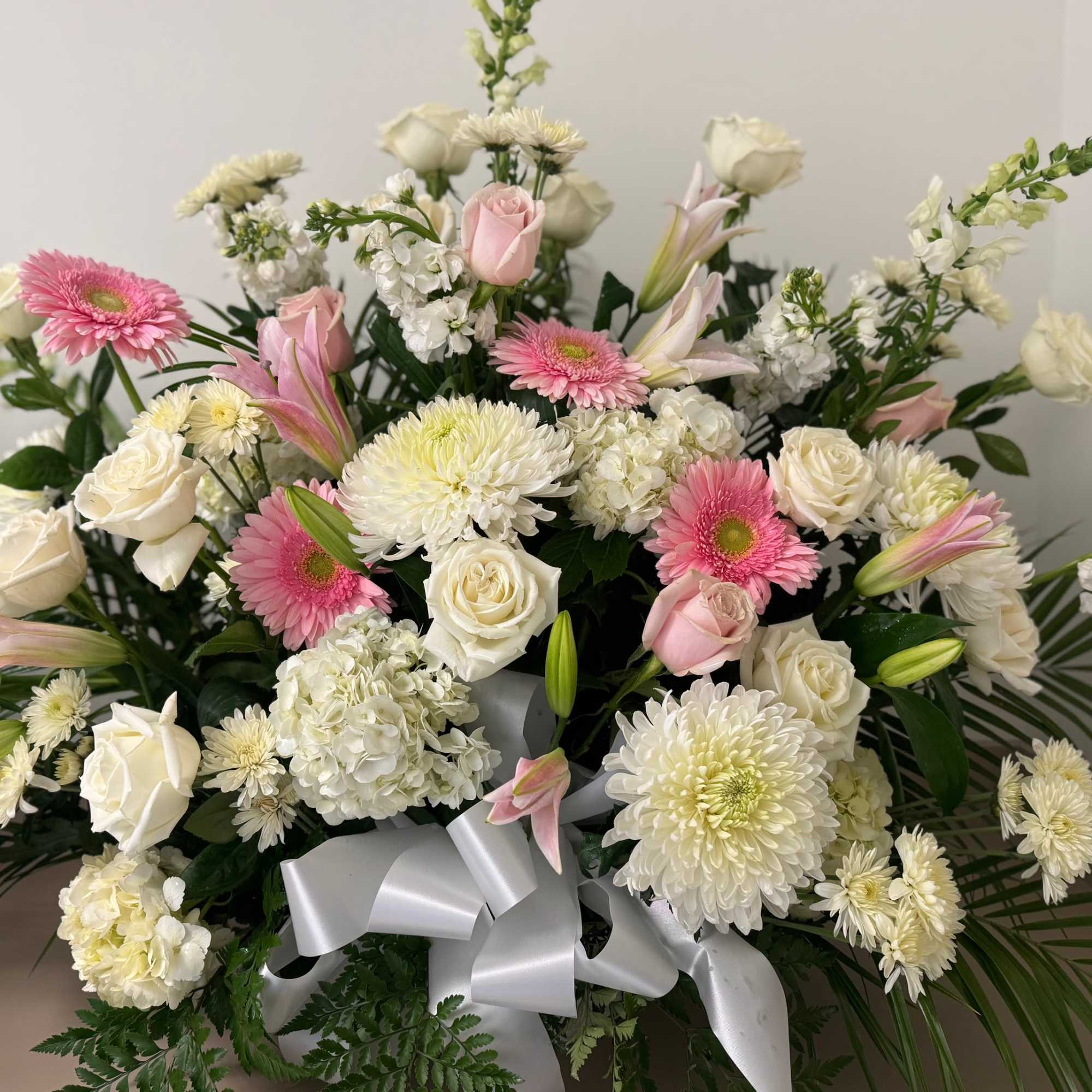 Pastel basket suitable for funeral services 