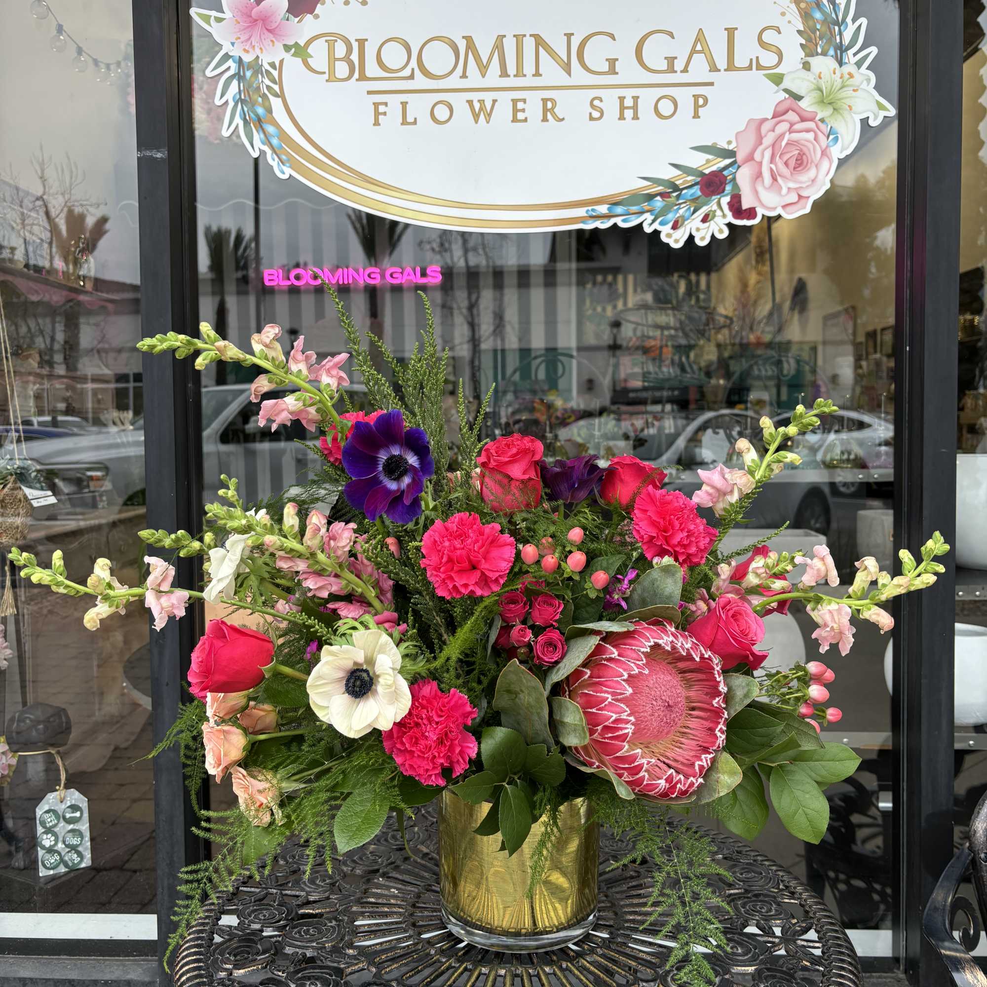 Beautiful mixed flowers of Pinks and fuschias with pops of purple and