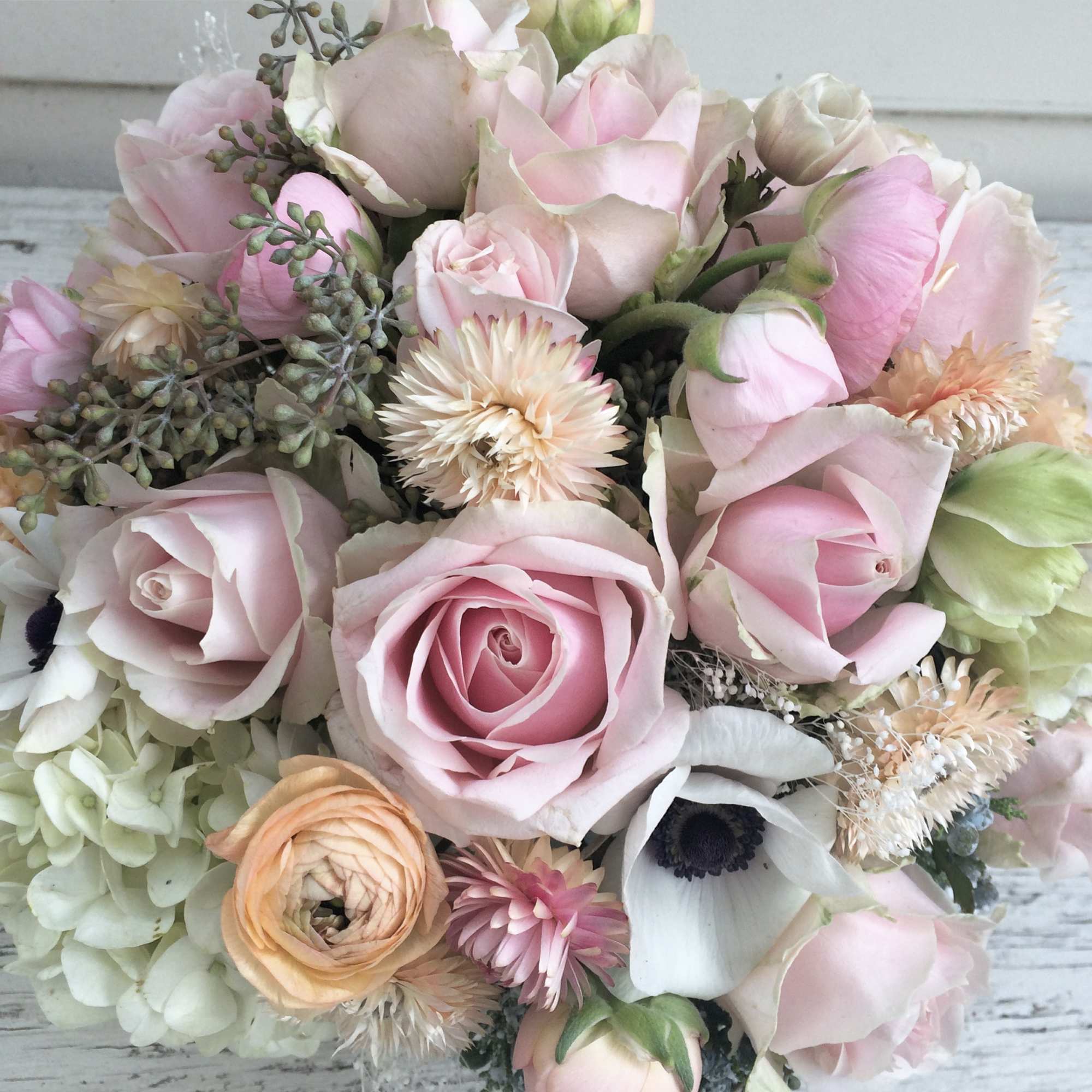 Milky white, ivory, light pink, powder, cream and dusty greens with the