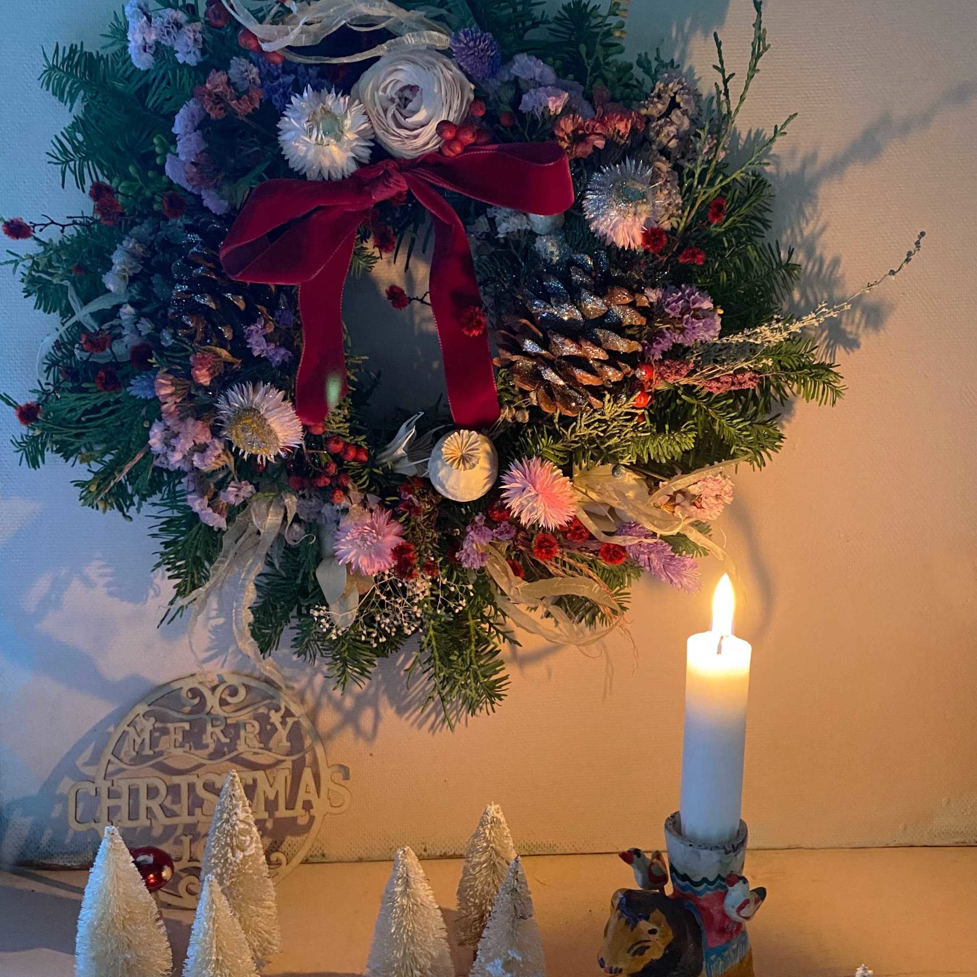 The most lovely wreath for the Holiday season of pine cones, dried