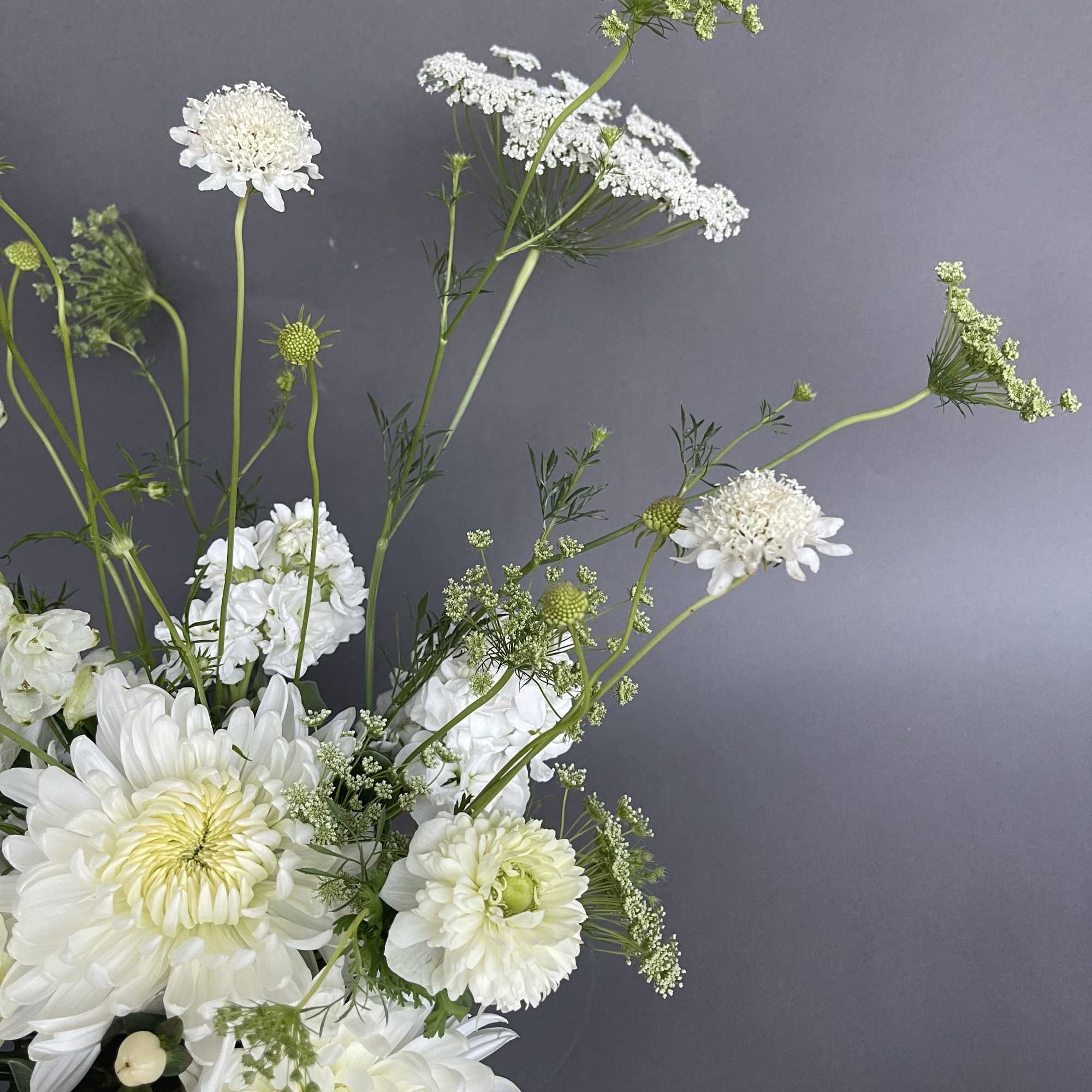 An all white lovely modern wild flower design. 