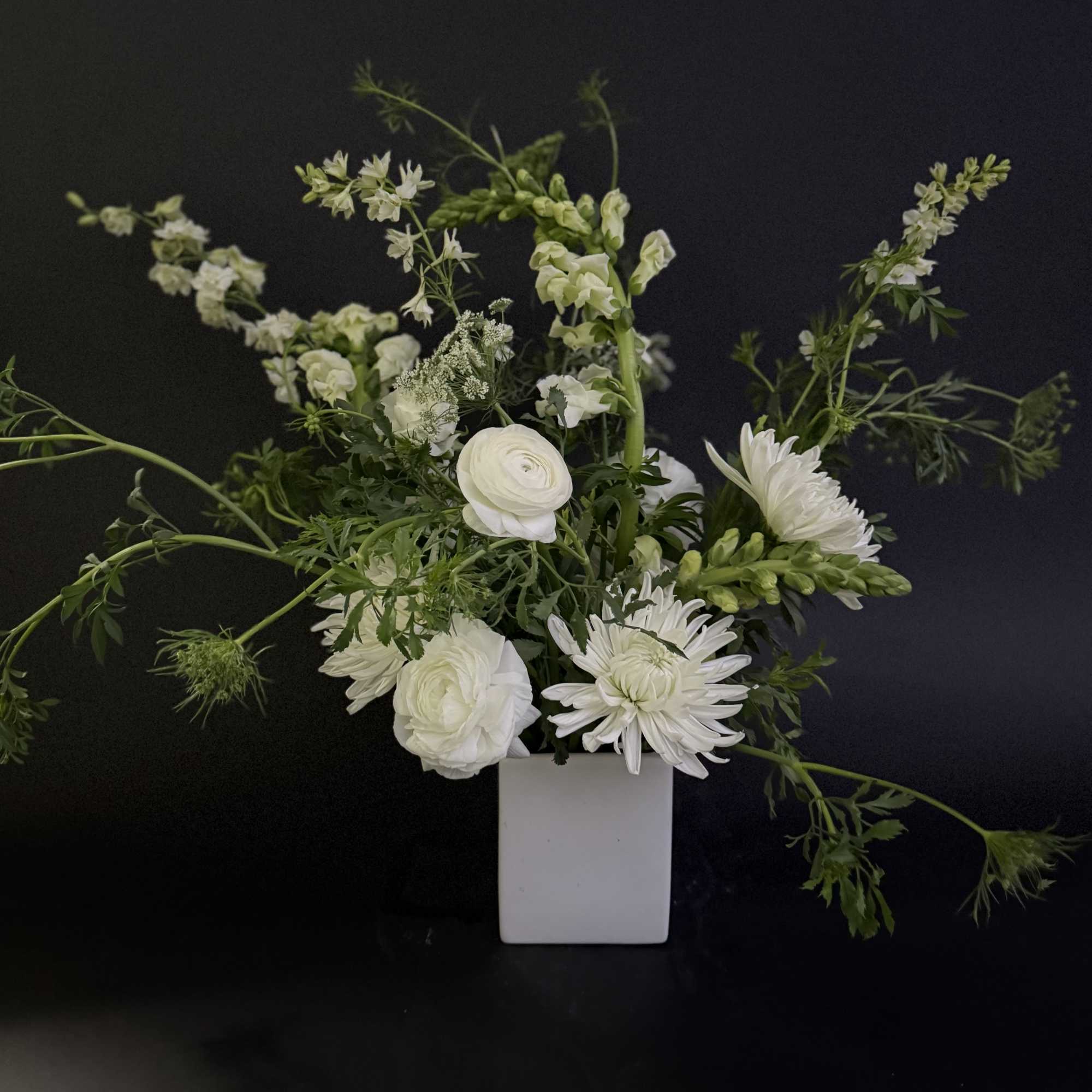 An all white lovely modern wild flower design. 