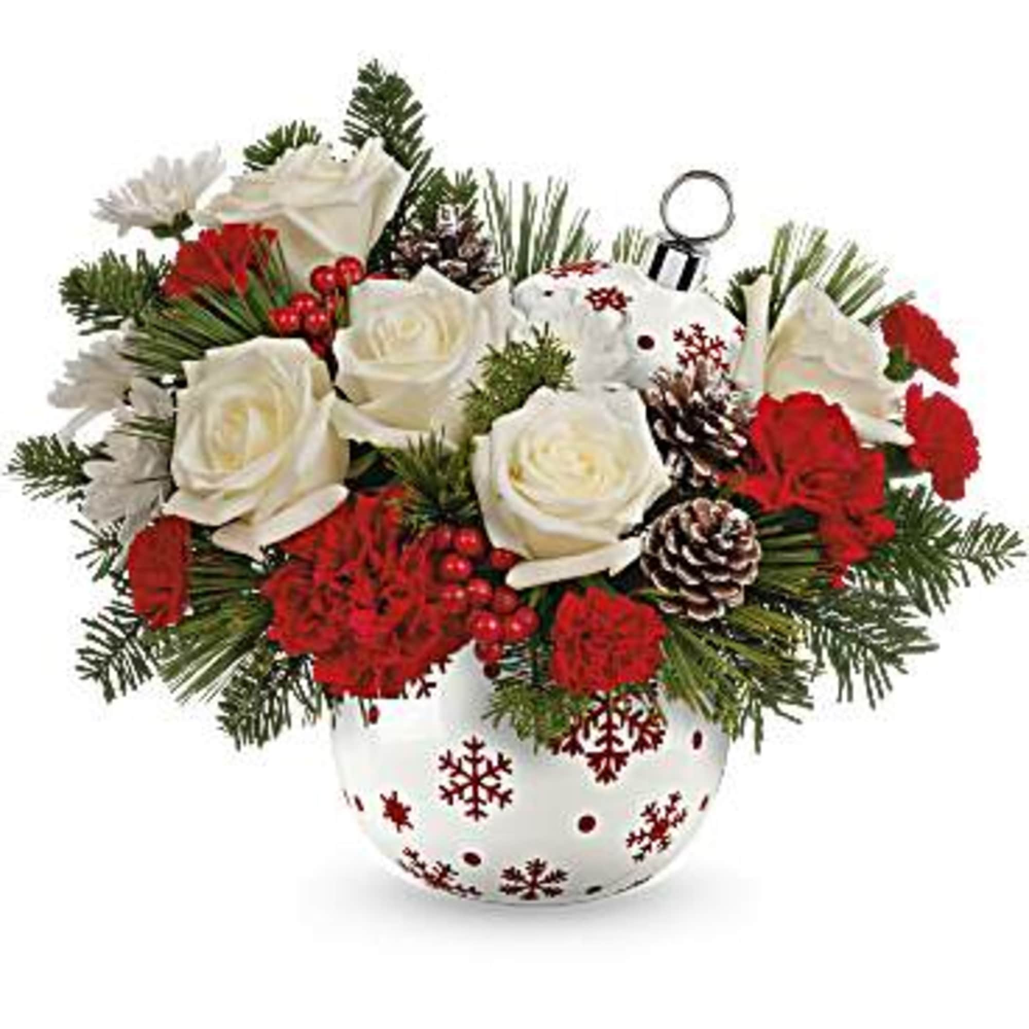 Illuminate the season with this vibrant Christmas bouquet, housed in a festive