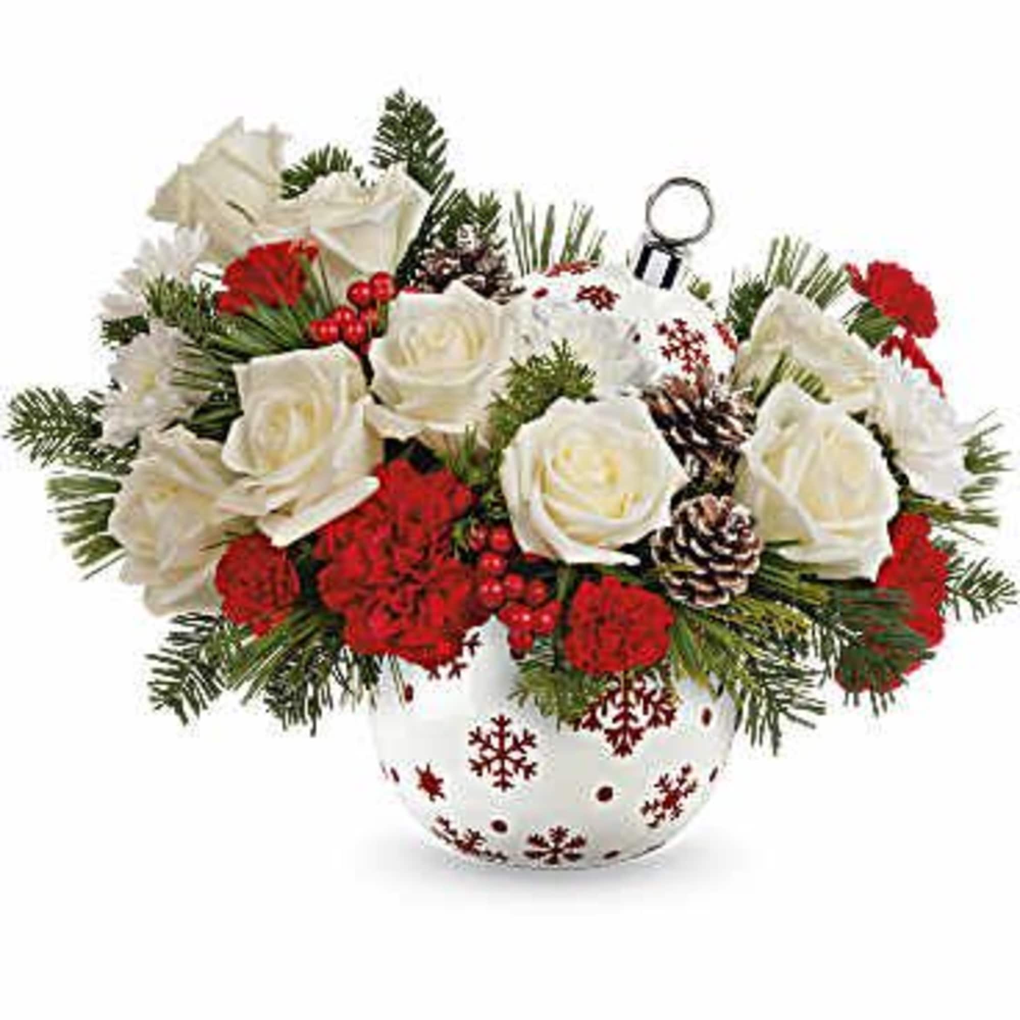 Illuminate the season with this vibrant Christmas bouquet, housed in a festive