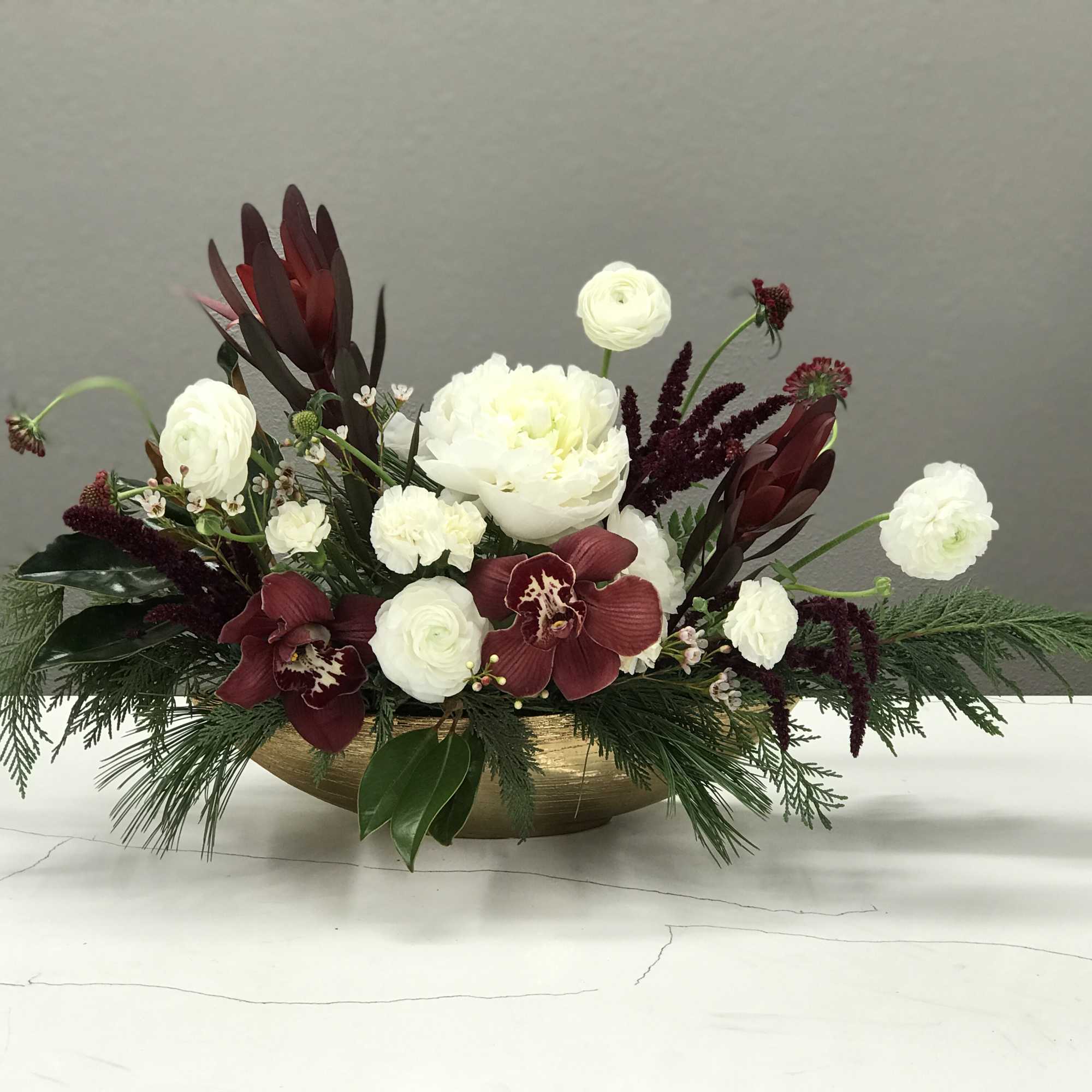 Ring in the Holiday Season with our Scandinavian-Inspired Floral Arrangement! Featuring rich