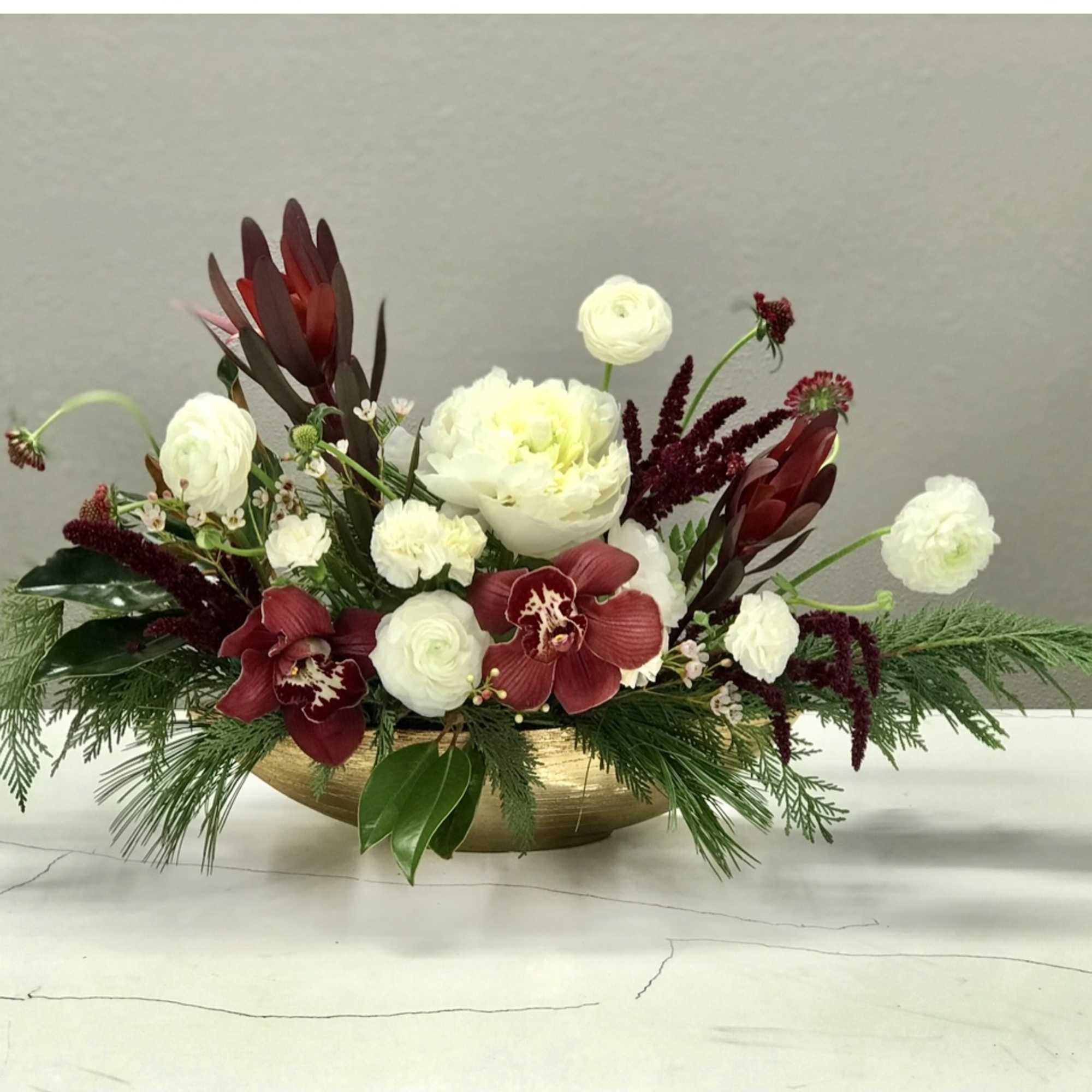 Ring in the Holiday Season with our Scandinavian-Inspired Floral Arrangement! Featuring rich