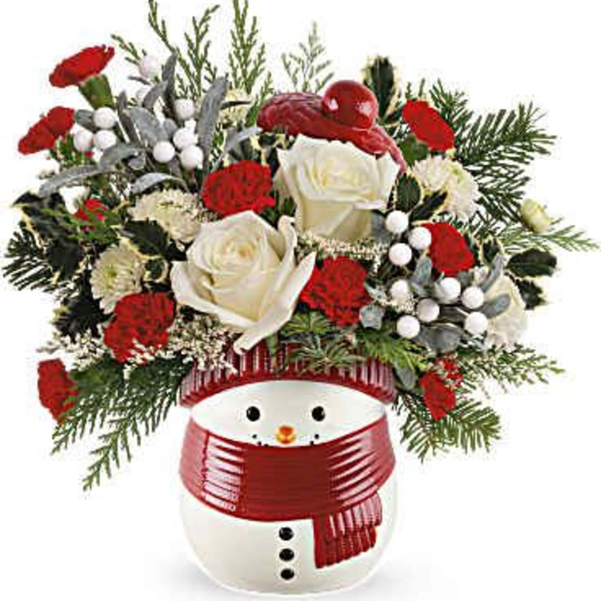 Charming and festive, this classic Christmas gift presents a delightful ceramic snowman