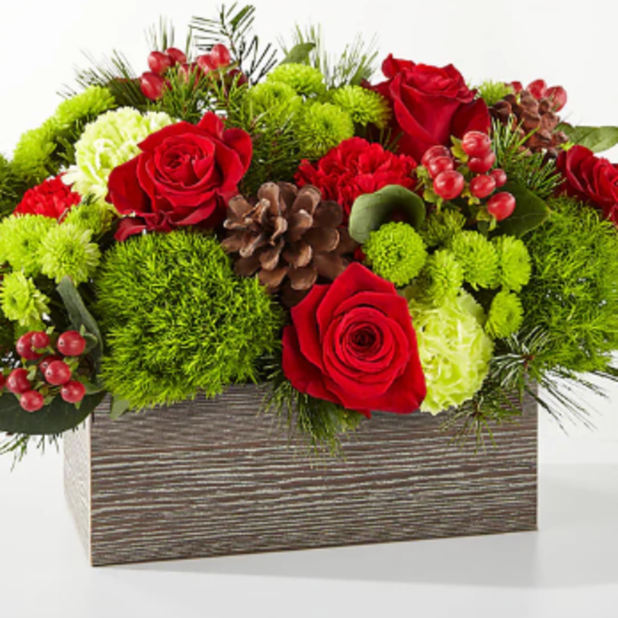 Filled with the essence of warmth and coziness, the Bundled Up Bouquet