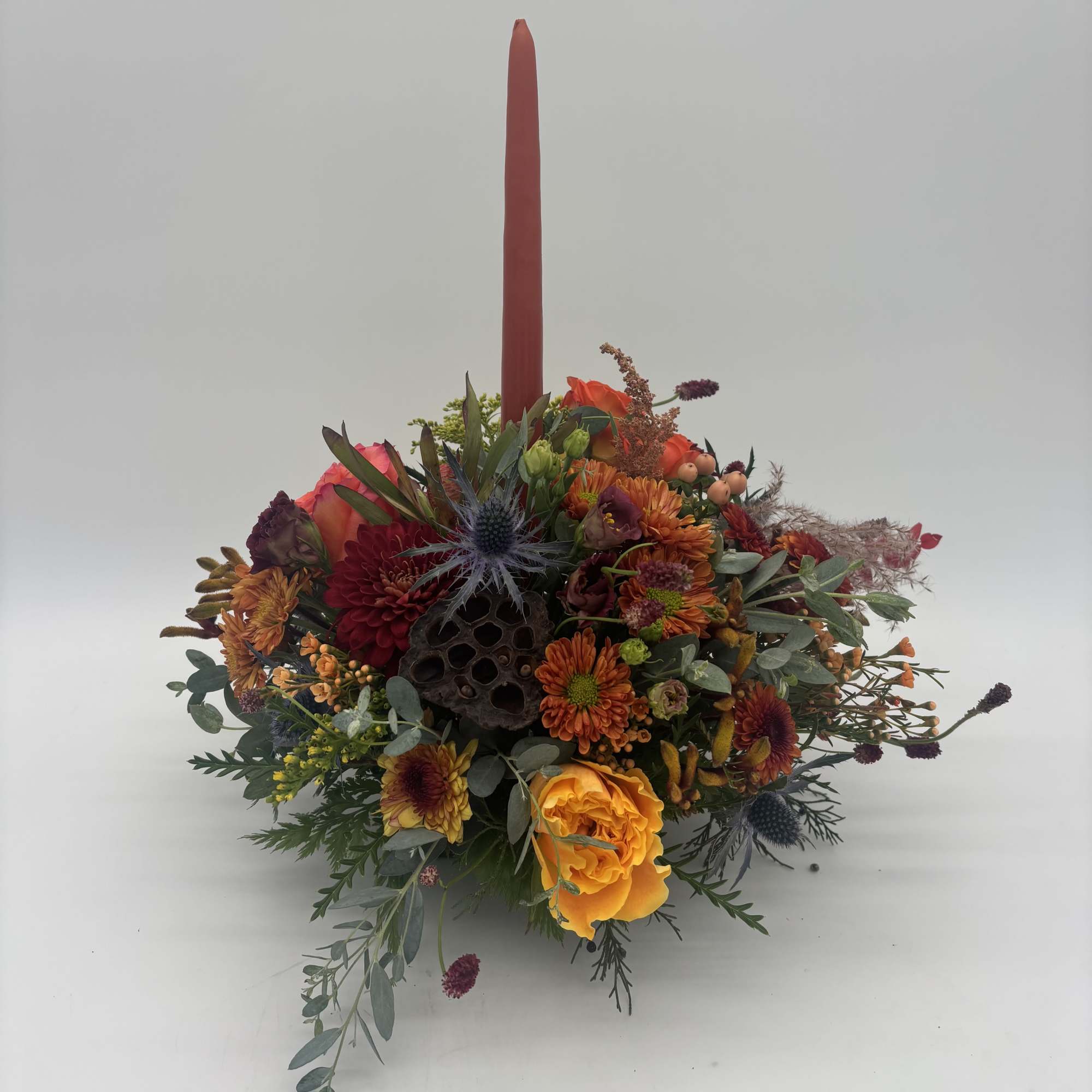 Traditional centerpiece made in 6&quot; designer dish. Included but not limited seasonal