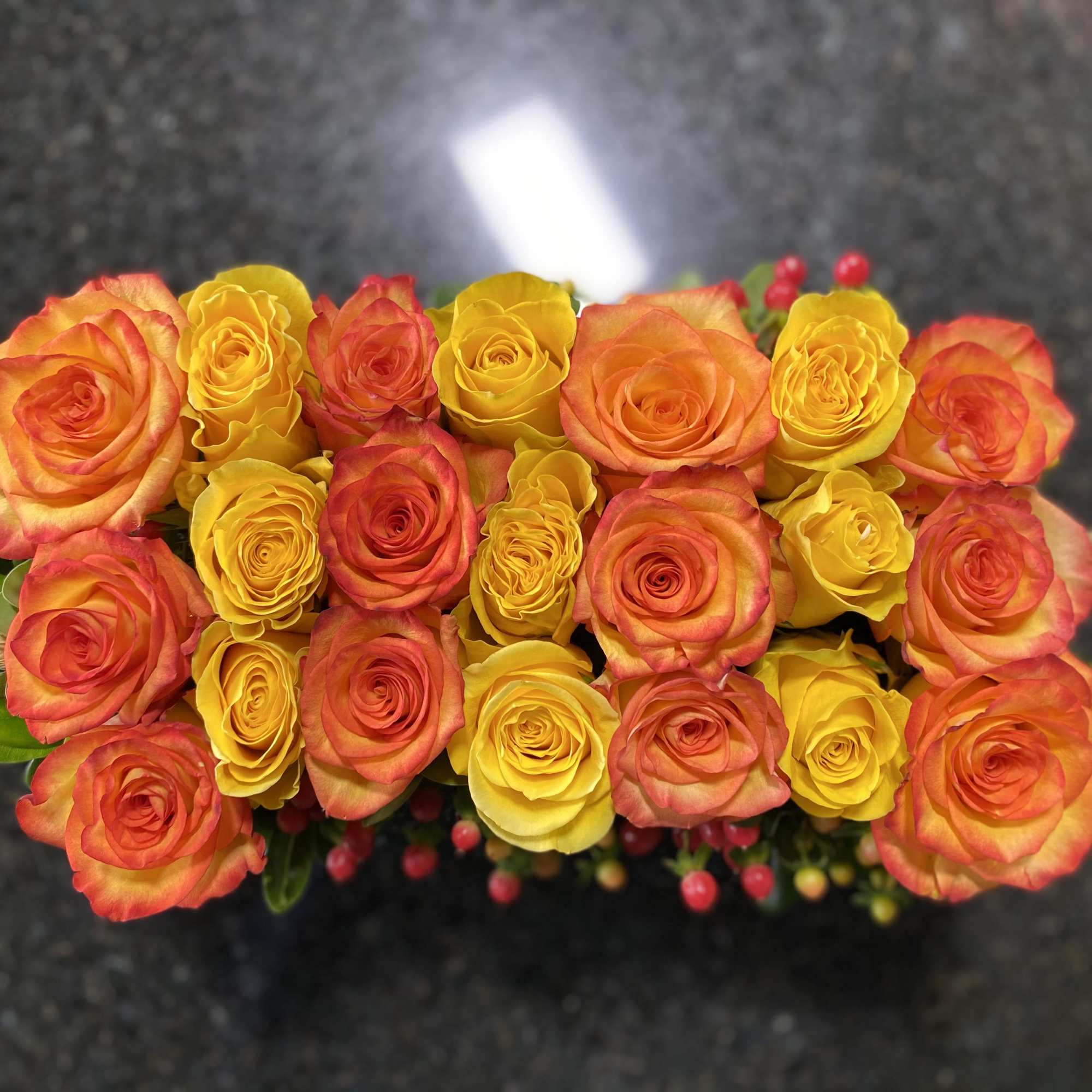 Table centerpiece arranged in 12 inch X 4 inch rectangle  -