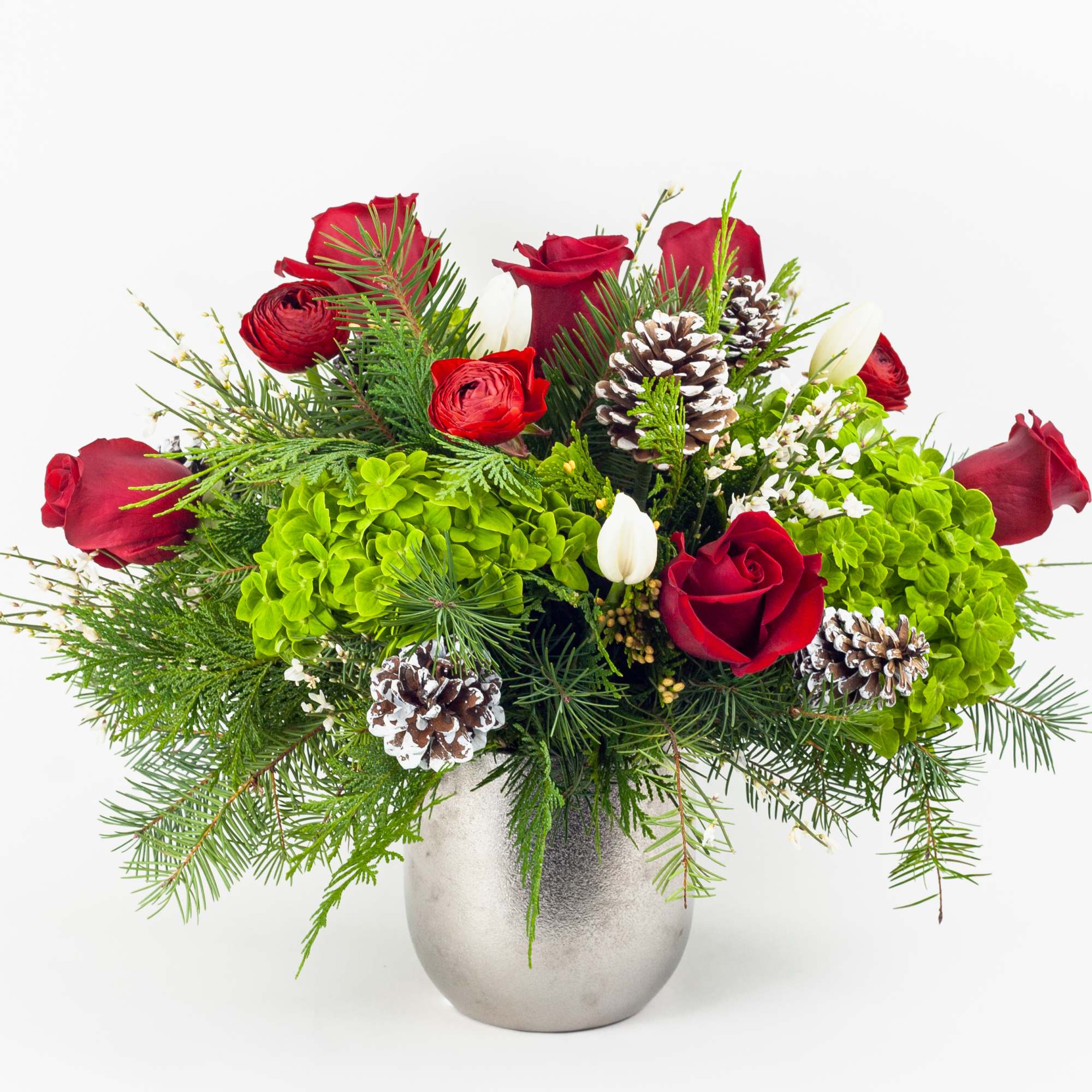 XMAS FLOWERS WITH RED ROSES, WHITE TULIPS &amp; RANUNCULUS 
Festive and bright.