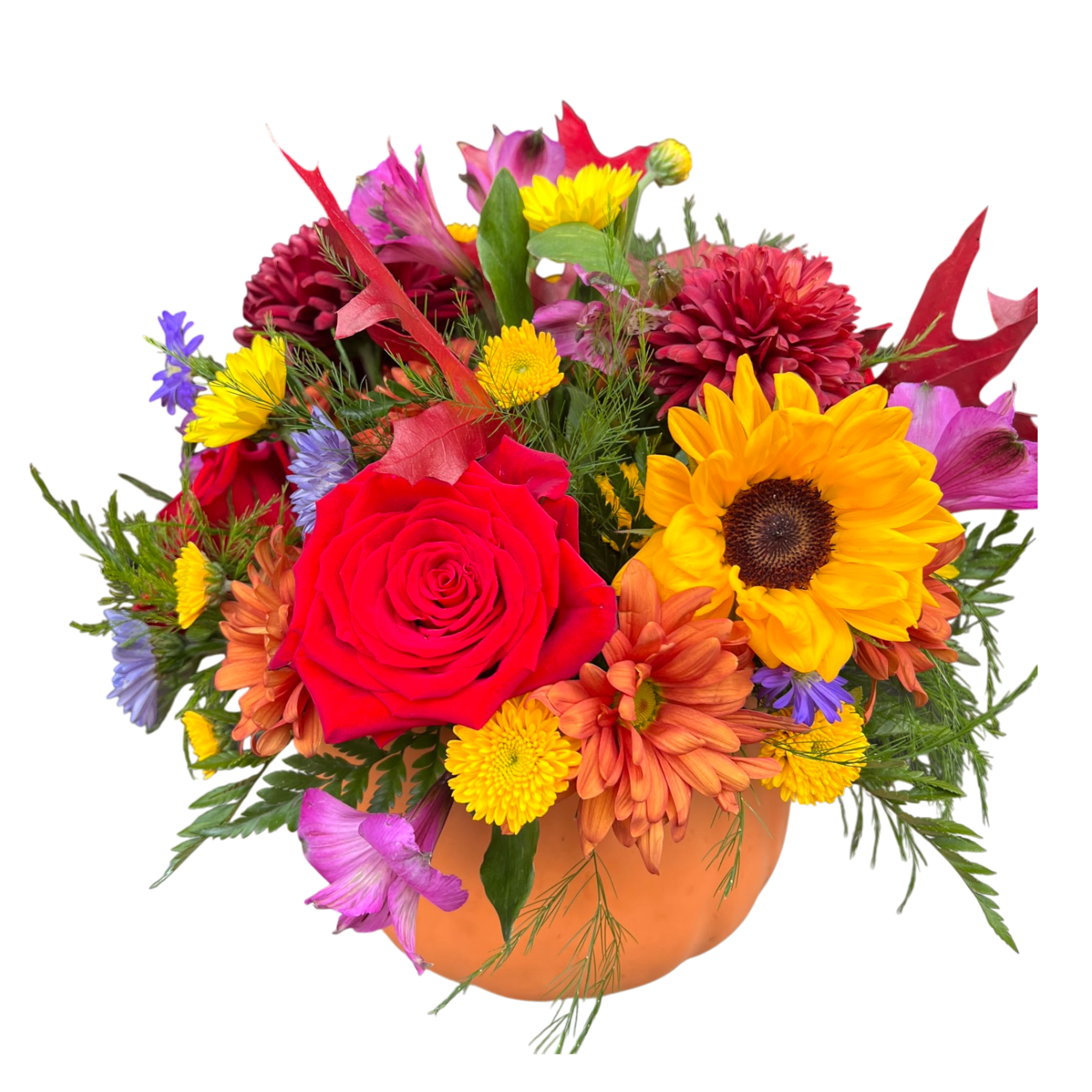 A ceramic pumpkin  overflowing with gorgeous fall flowers will compliment your