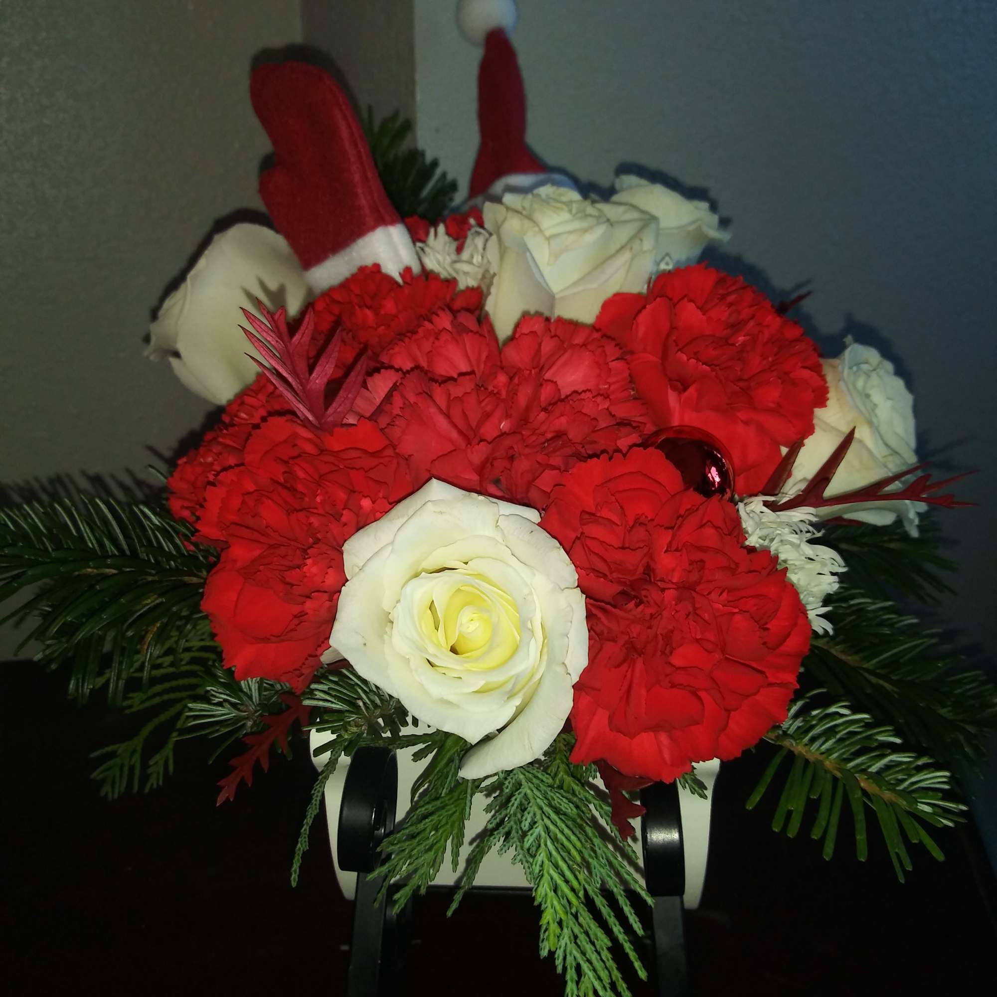 This cute sleigh arrangement is a great attention getting piece. With the