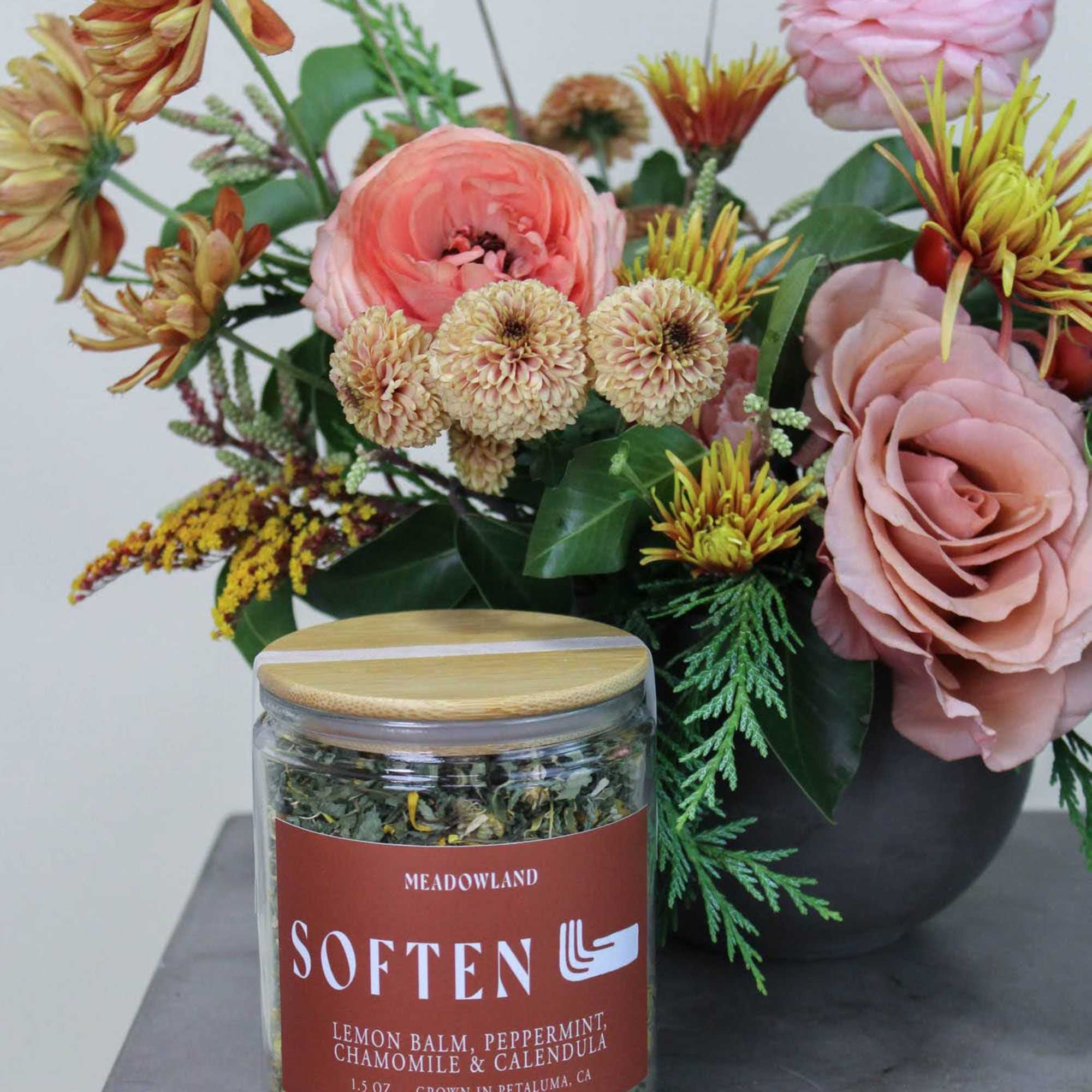 A gift bundle of winter floral and locally crafted tea, a perfect