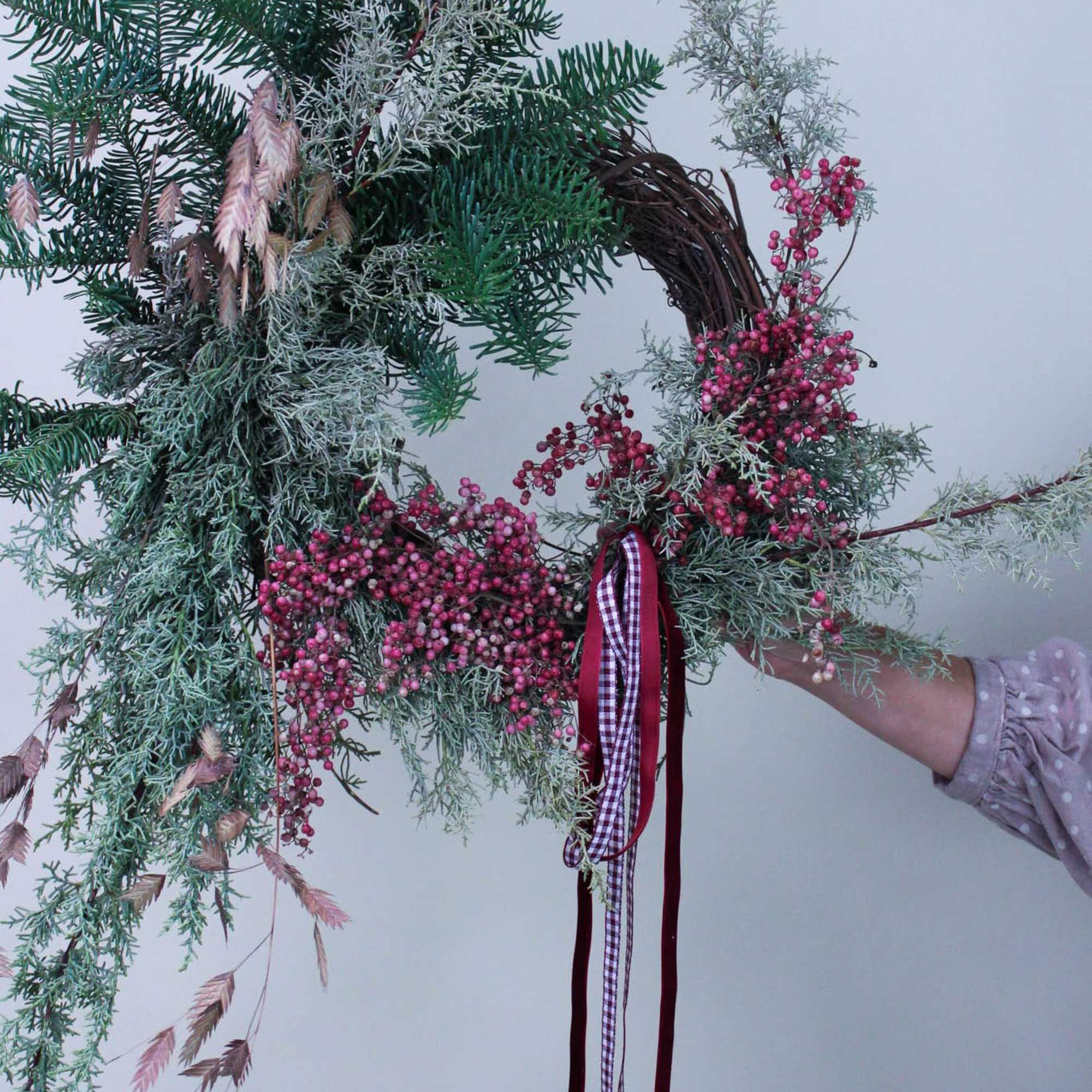 The perfect evergreen wreath to fit any front door. 

*Images are a