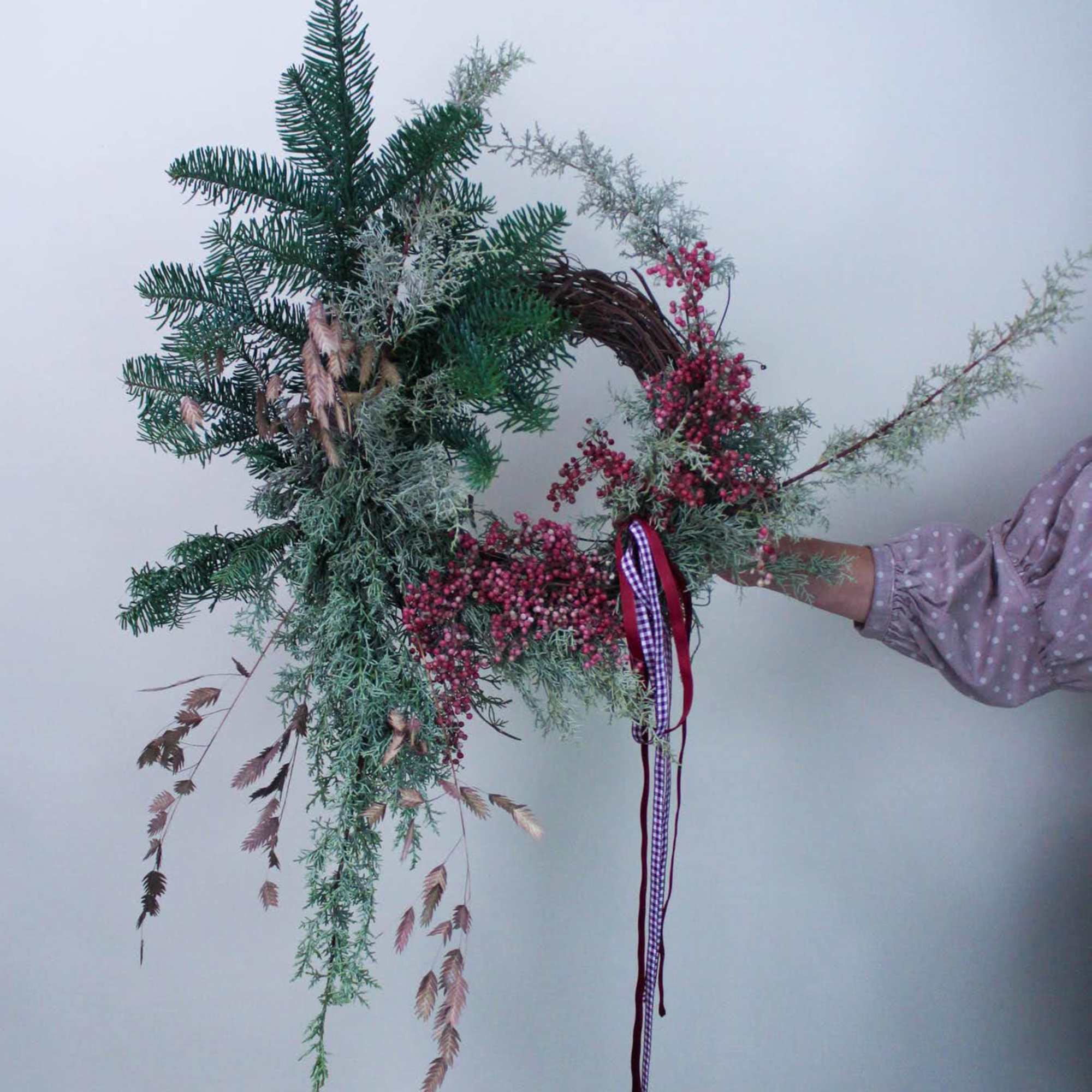 The perfect evergreen wreath to fit any front door. 

*Images are a