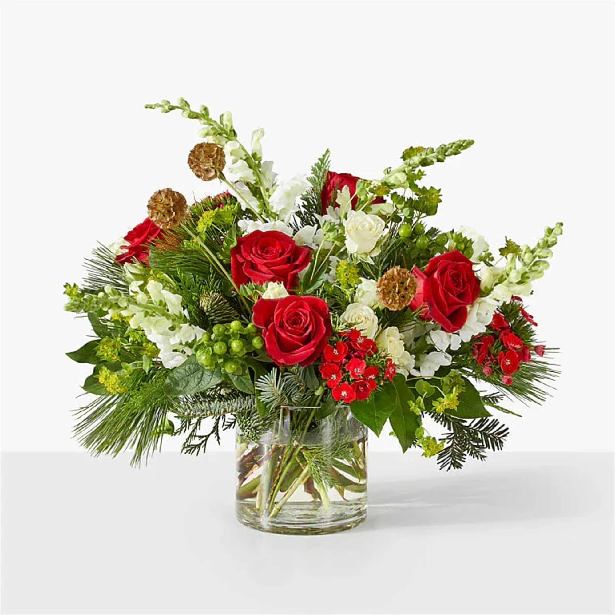Elegant and modern, this beautiful bouquet is expertly designed with red roses
white