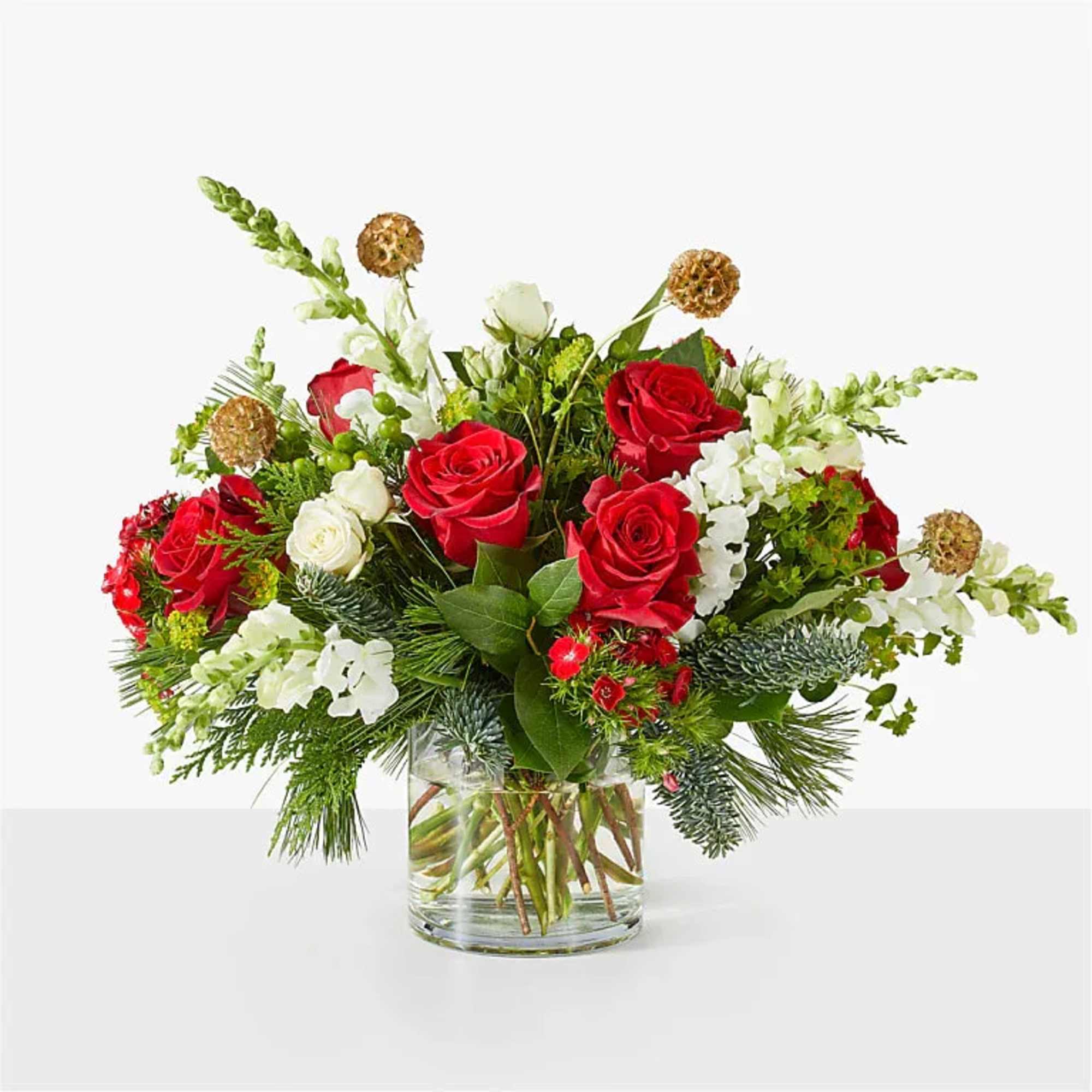 Elegant and modern, this beautiful bouquet is expertly designed with red roses
white
