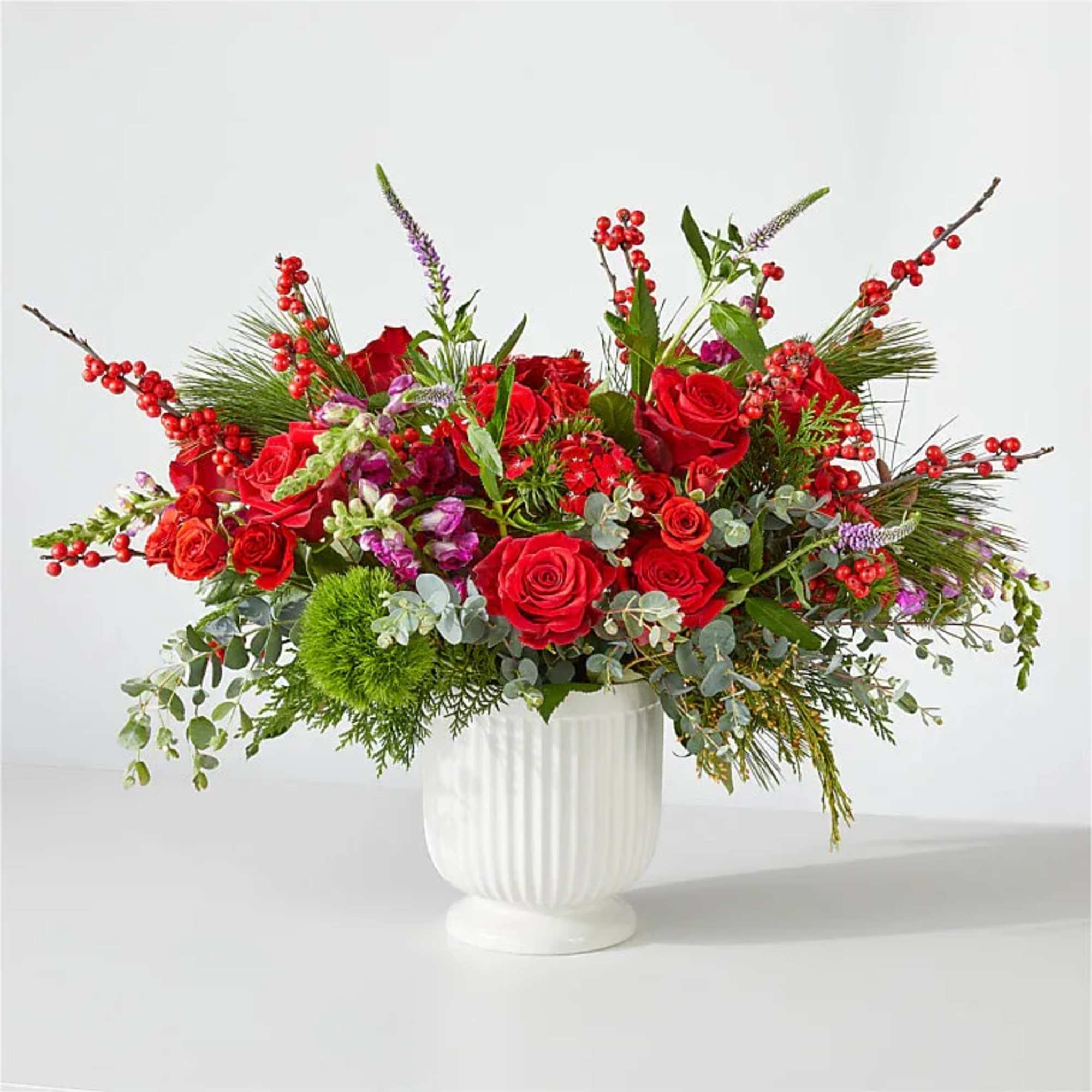 Make a statement this holiday season with the Big Red Bow Bouquet
an
