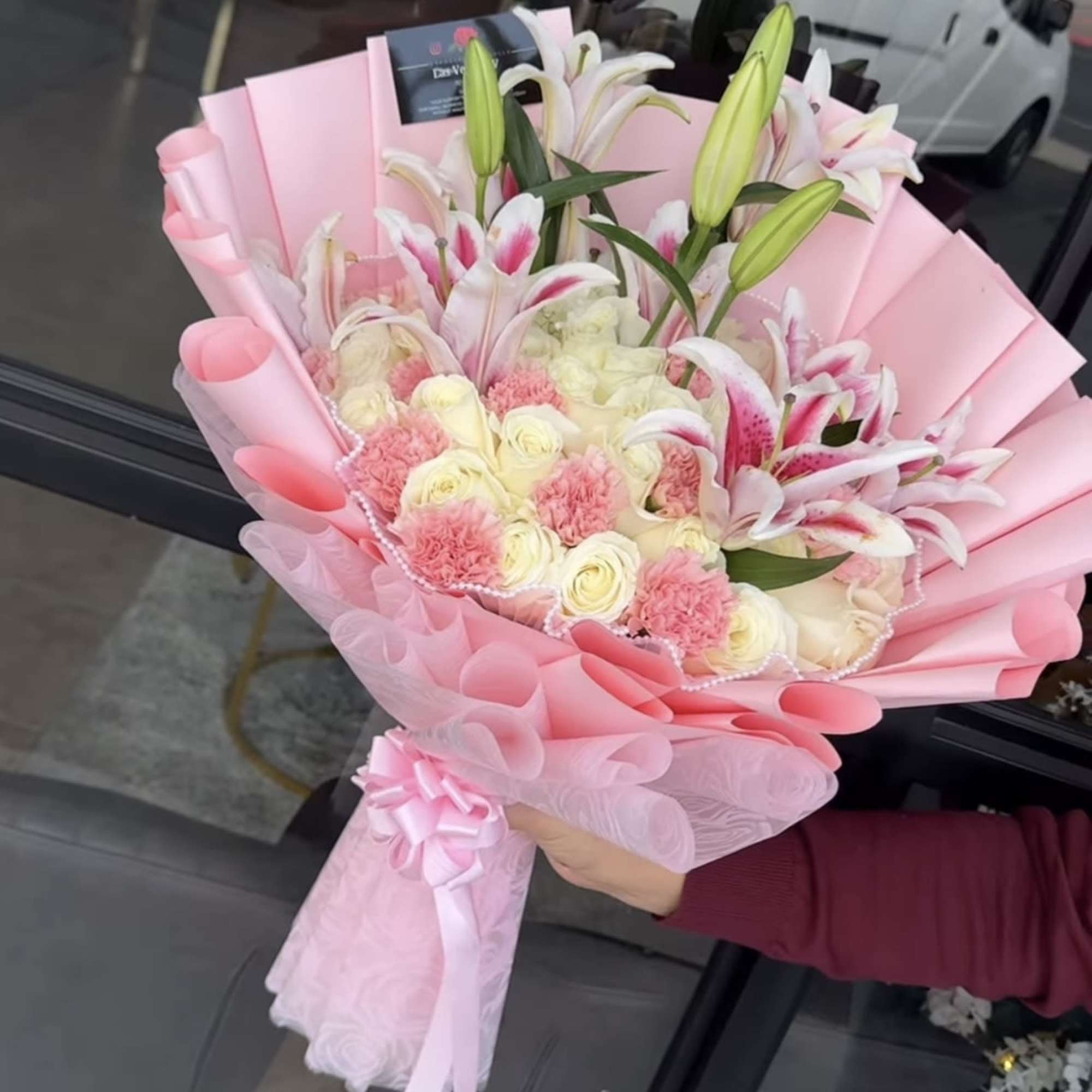 roses carnations and lilies

If you want to request a color wrapping of