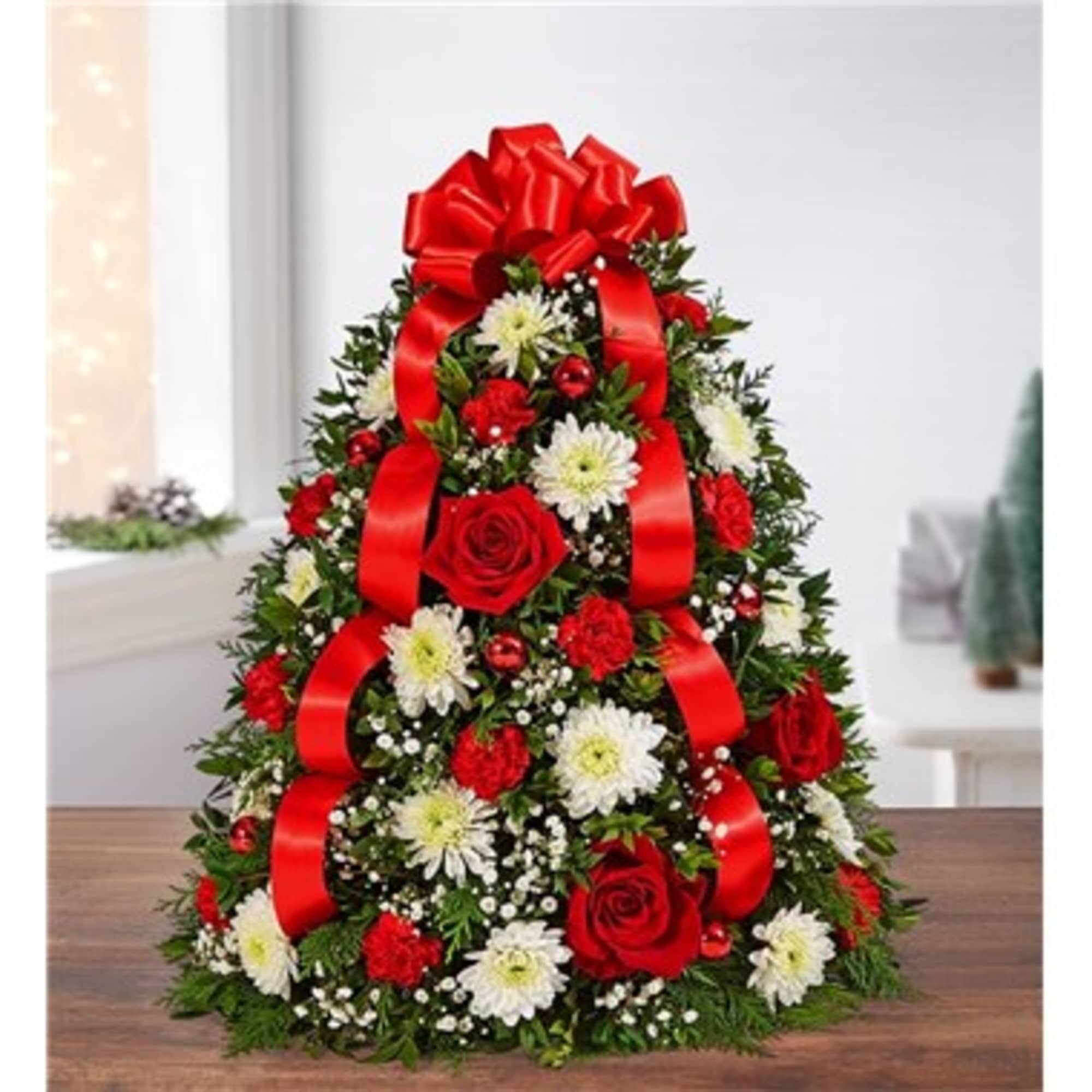 The holiday favorite that started it all! Our flower tree arrangement is