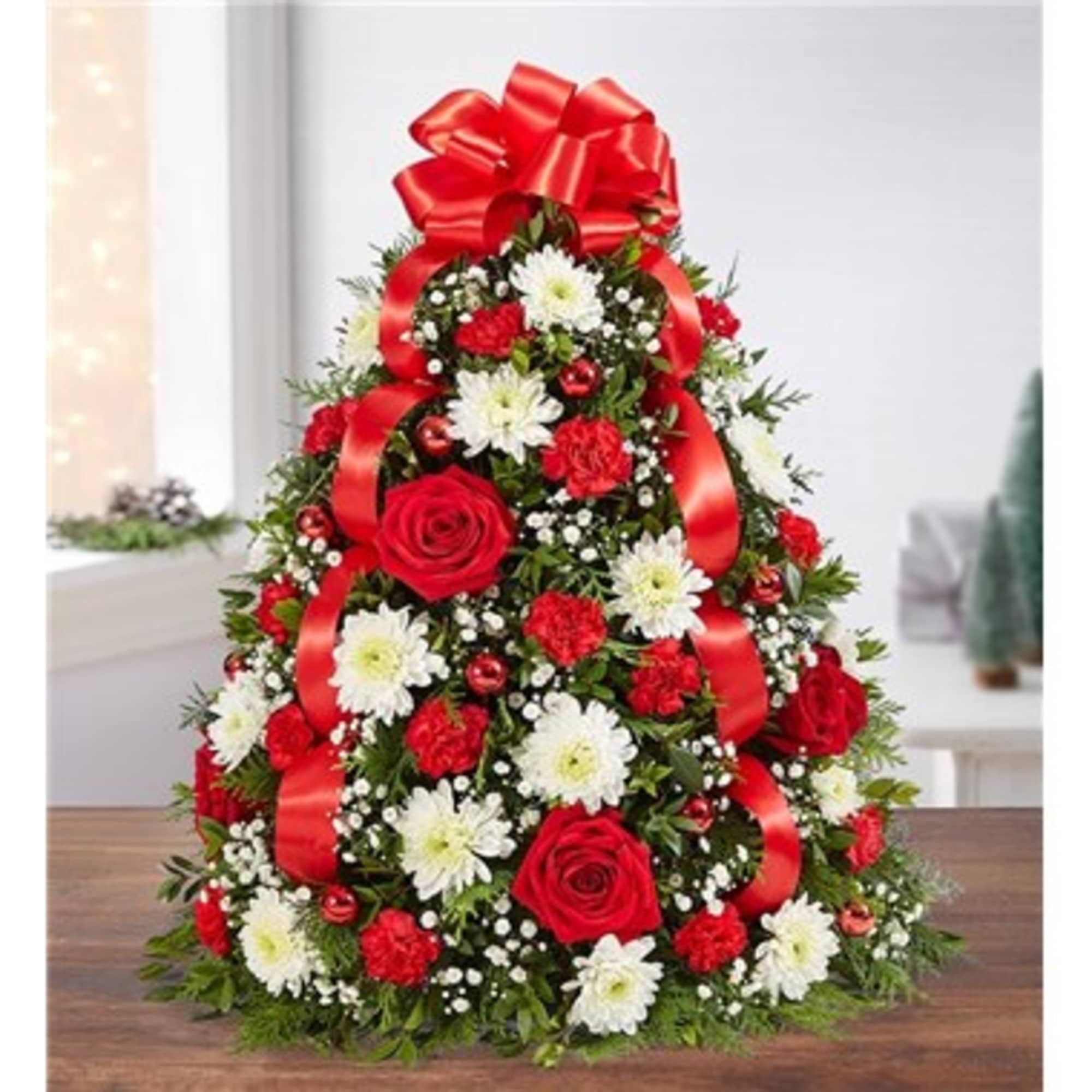 The holiday favorite that started it all! Our flower tree arrangement is