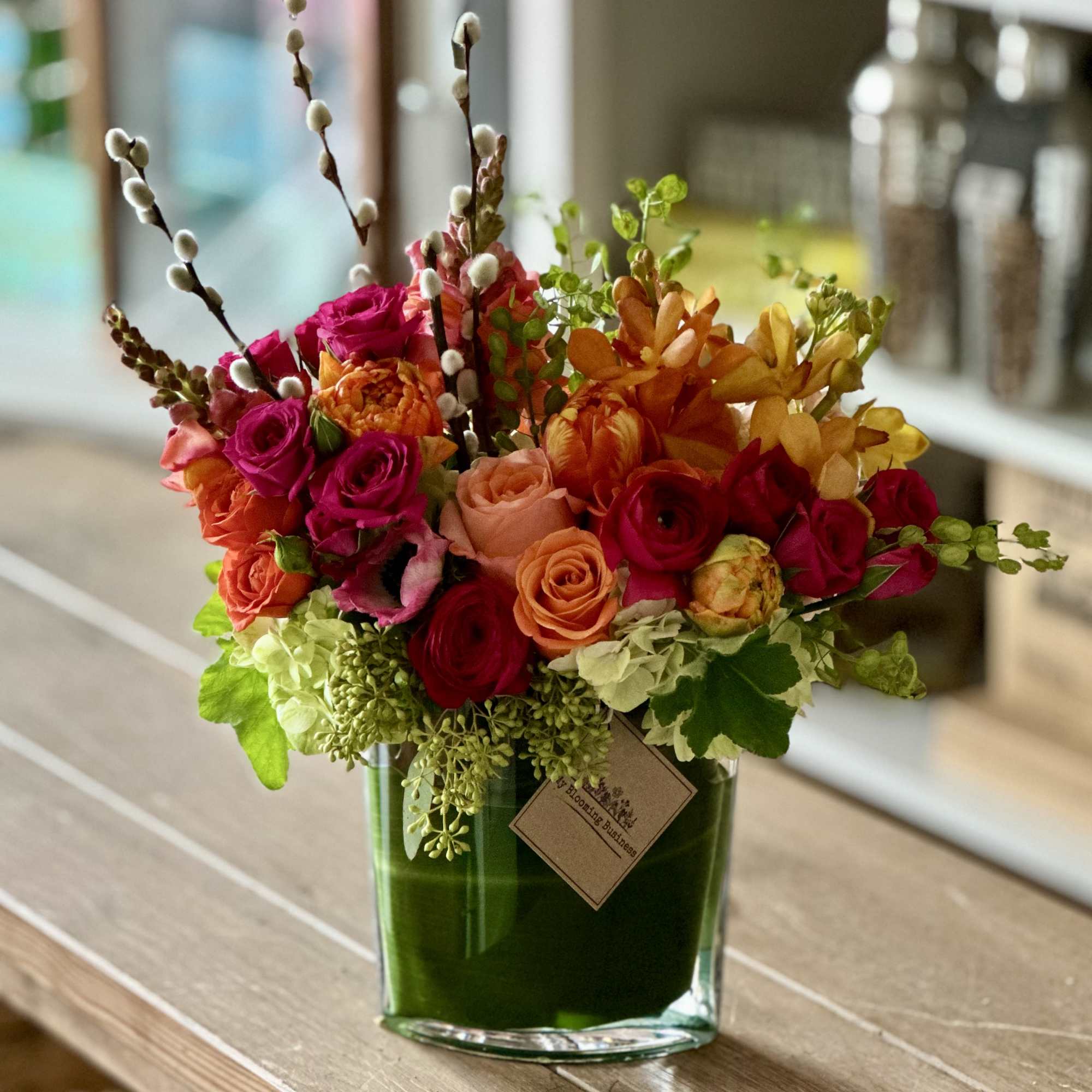 Experience effortless elegance with the Buena Vista Arrangement, a vibrant floral design