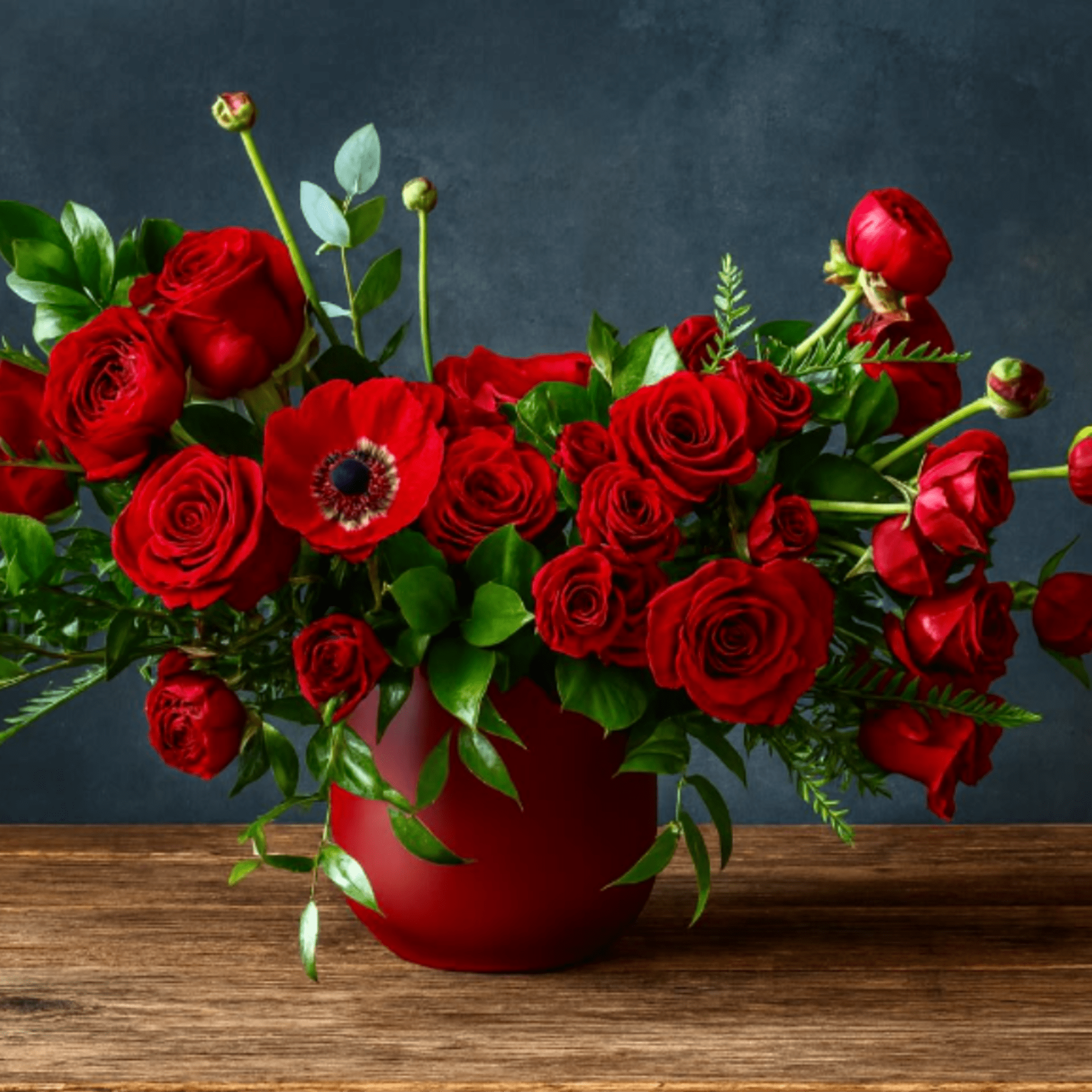 Our Anita arrangement is an all red flower arrangement filled with Red