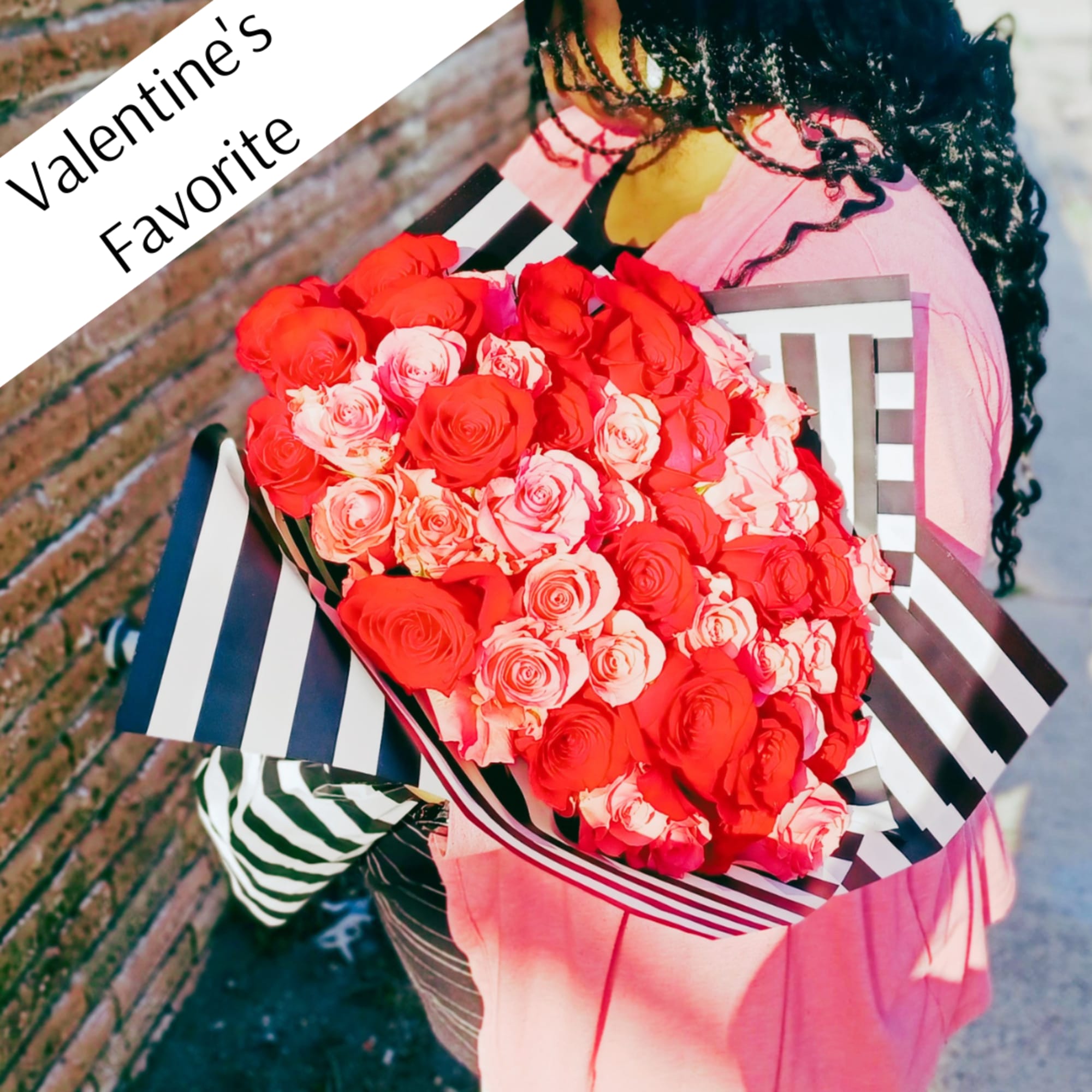 Your love will swoon over this enormous bouquet of 50 roses. Half