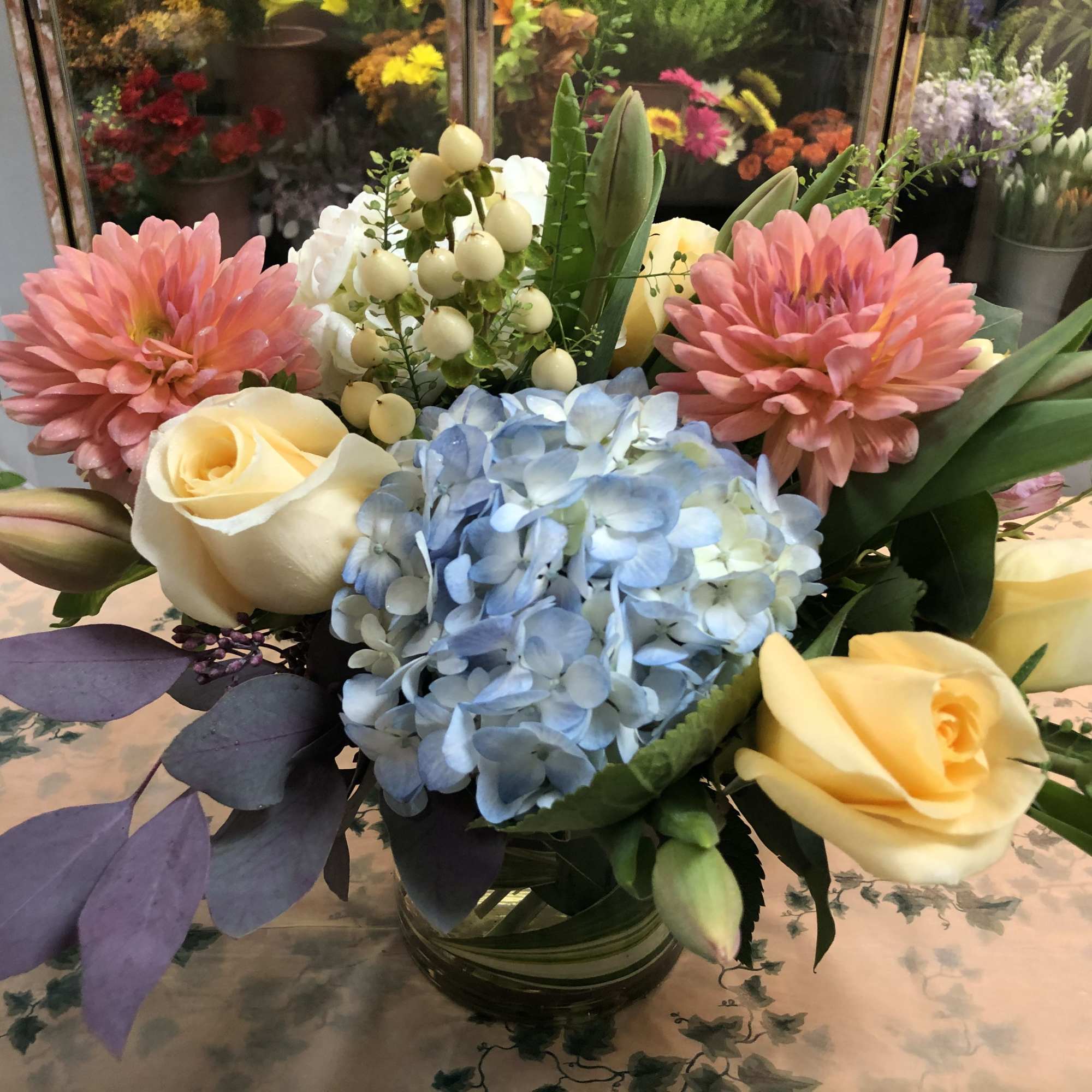 Hydrangea,  Roses,   Light Pink Peonies(Seasonal) , Dahlia(Seasonal), Hypericum, Fancy