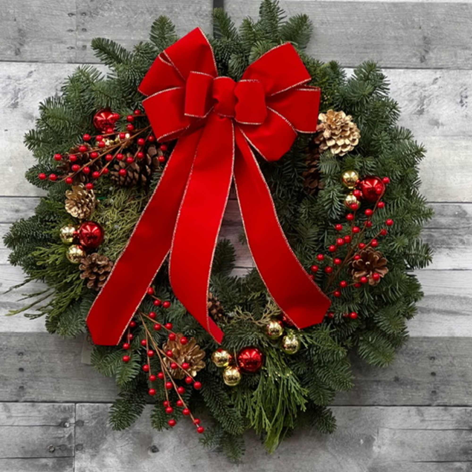 24&quot; Noble fir wreath, with holiday bow.  The Deluxe and Premium