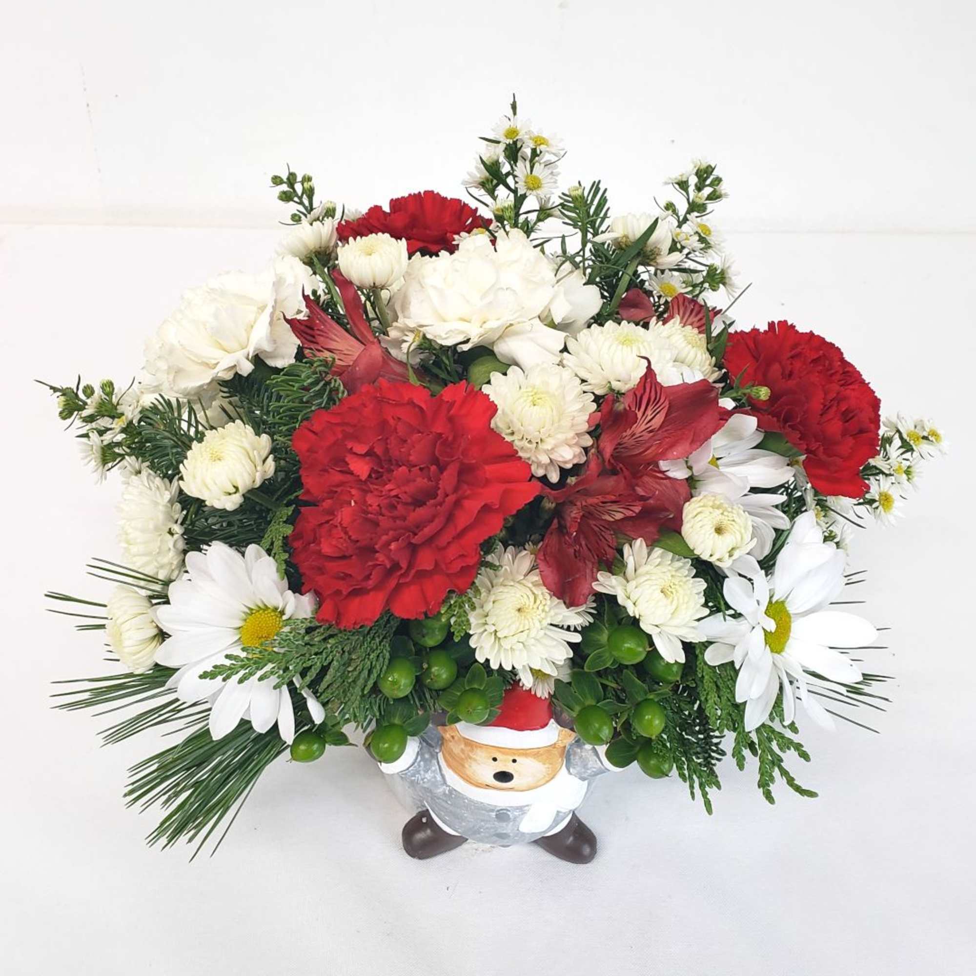 Oh so cute! Fresh and colorful blooms in a ceramic bear container.