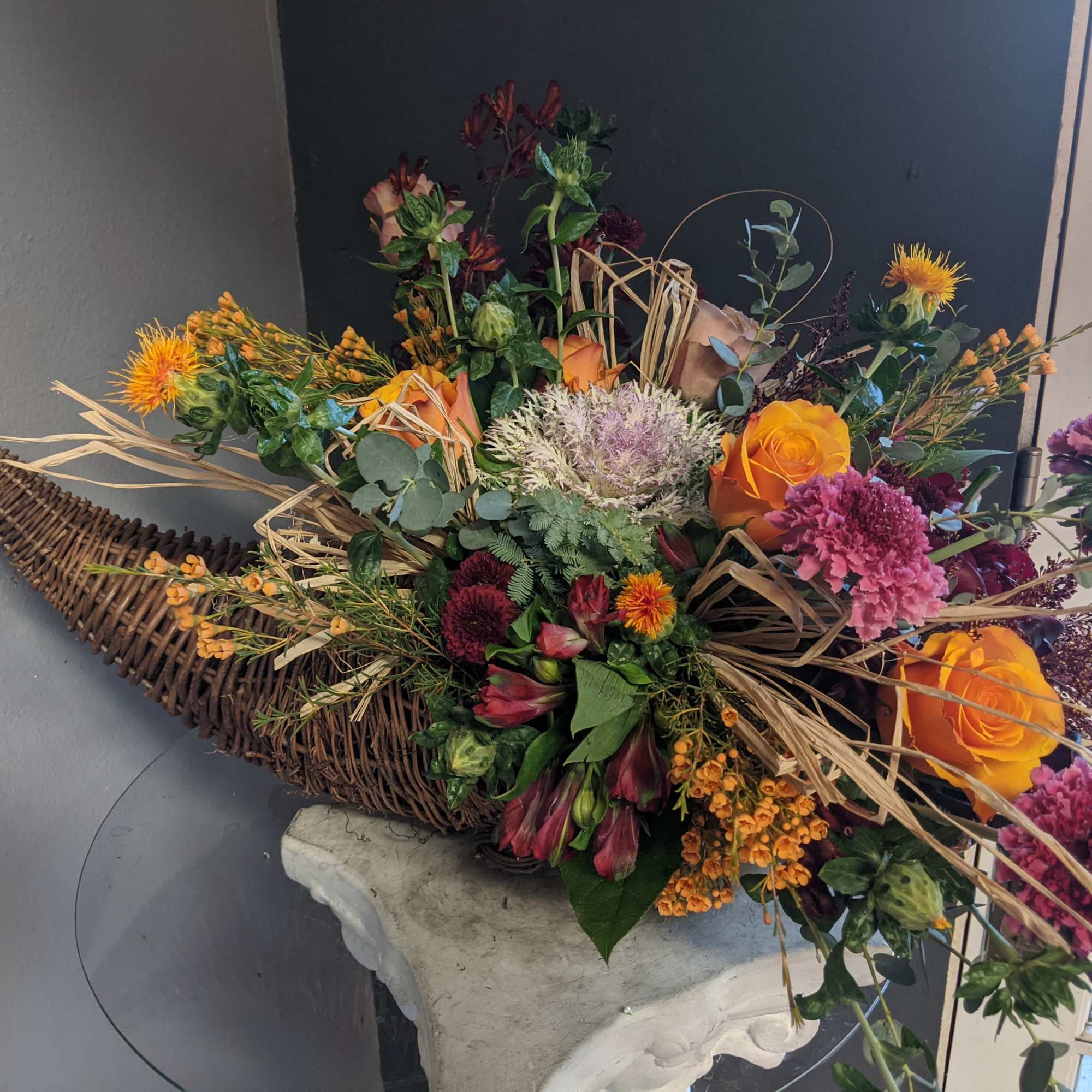 A beautifully selected bunch of the freshest flowers in a vase uniquely