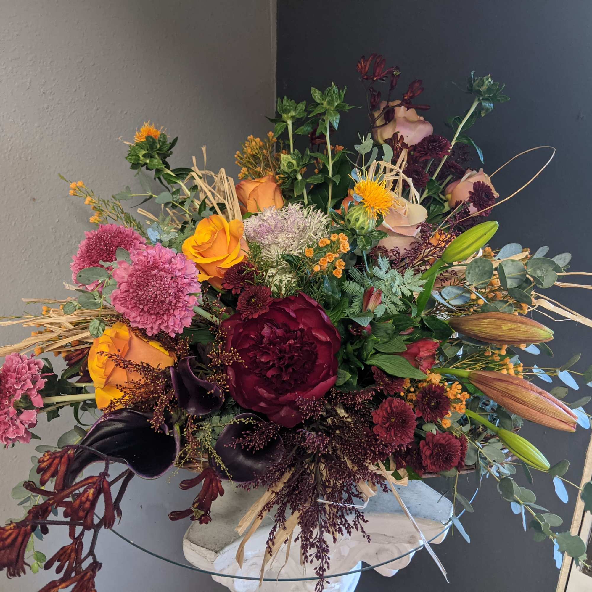 A beautifully selected bunch of the freshest flowers in a vase uniquely