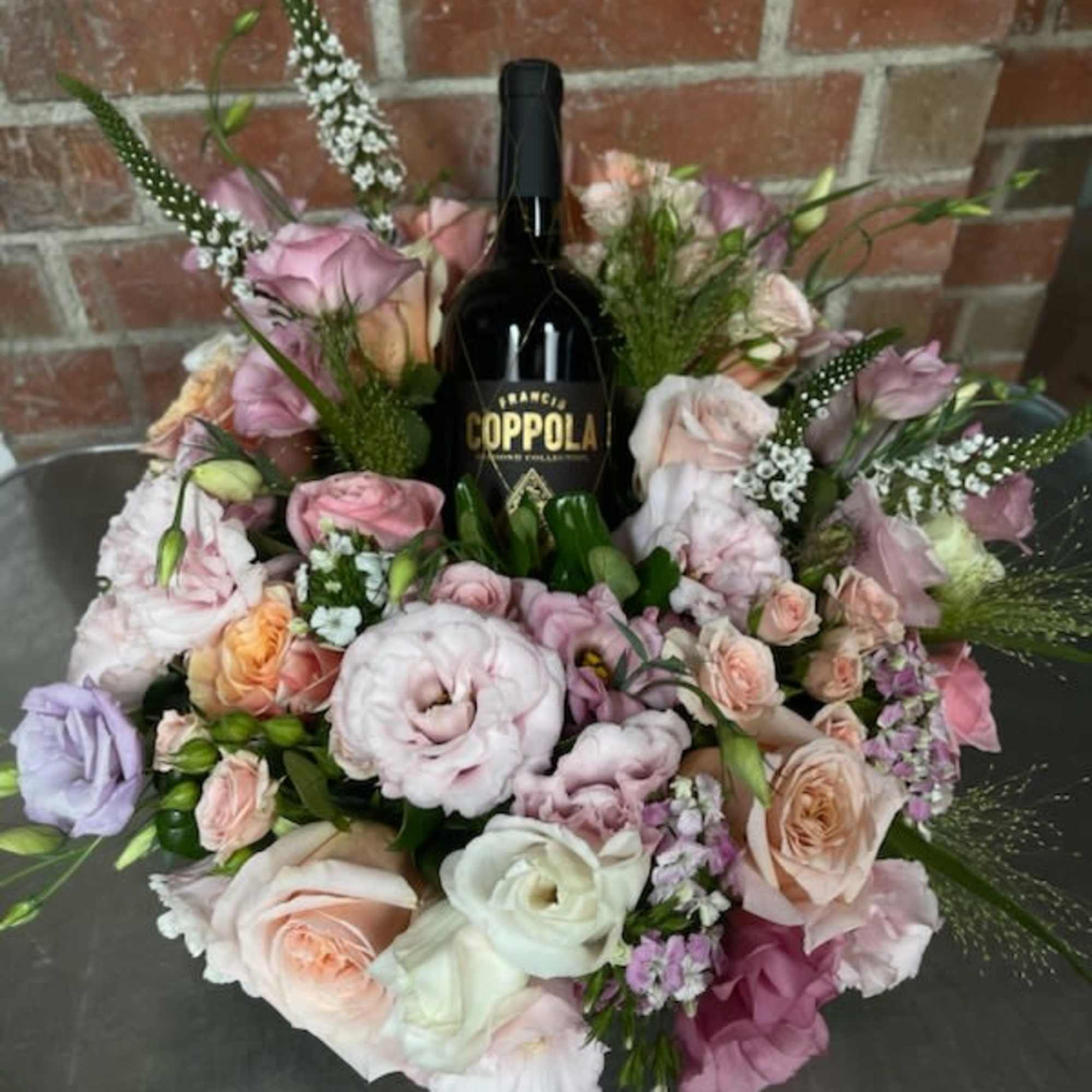 Blossoms of Celebration

Seasonal Mixed Flower arrangement with Francis Ford Coppola Diamond Collection