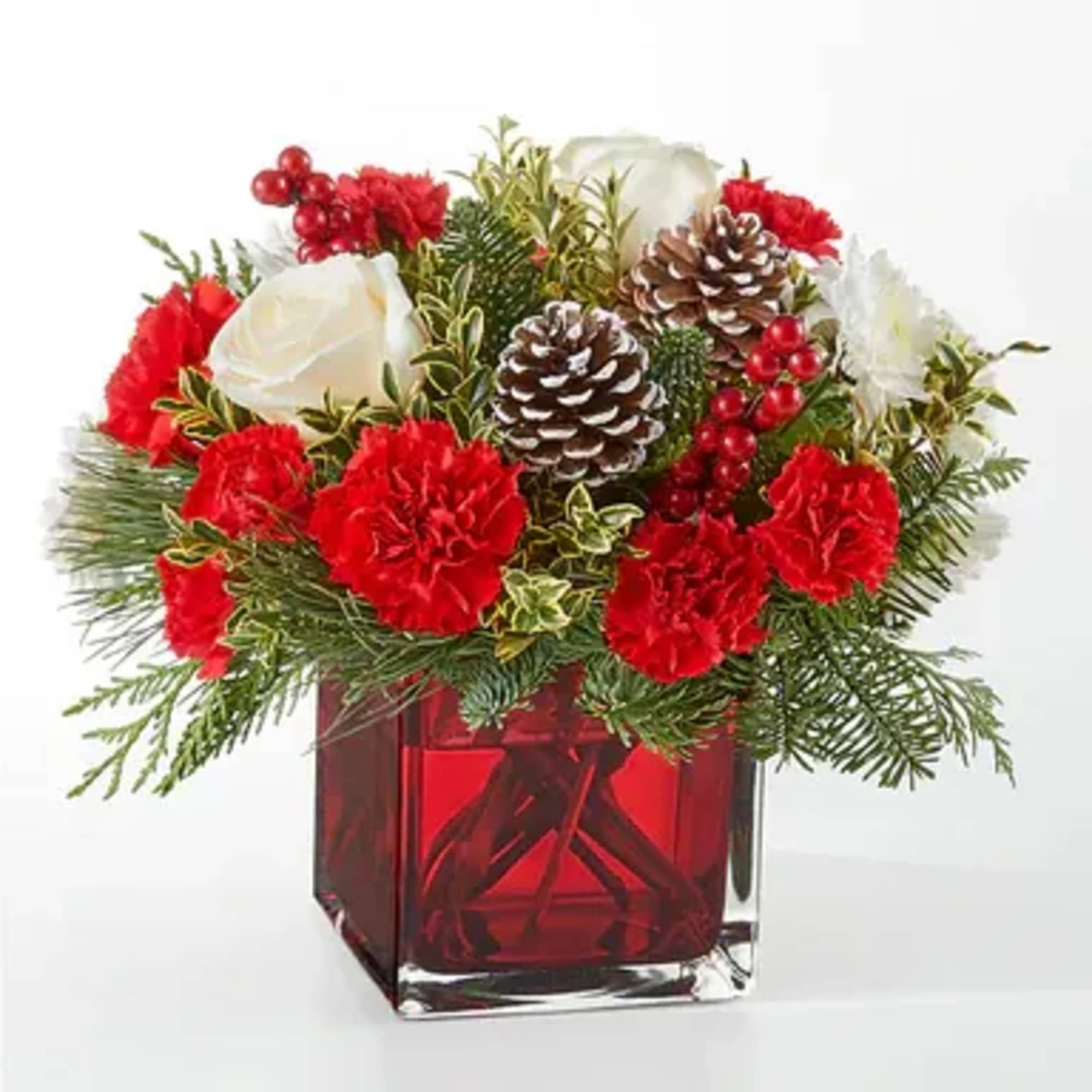An aromatic experiece, the Christmas Market Bouquet includes assorted seasonal greens to