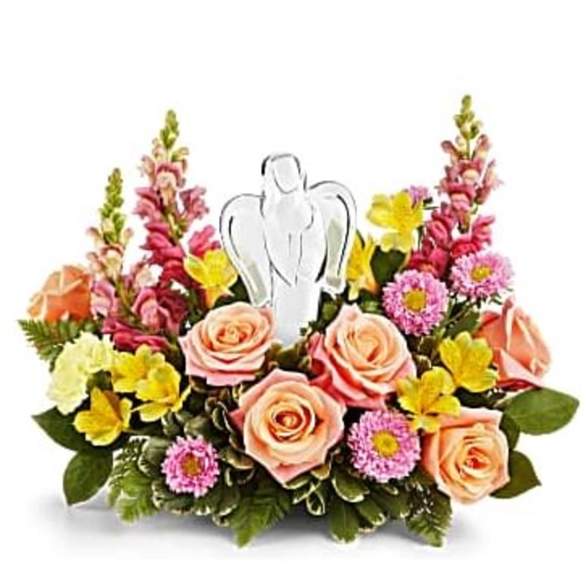 Radiating peace and comfort, these peach roses and lovely pink and yellow