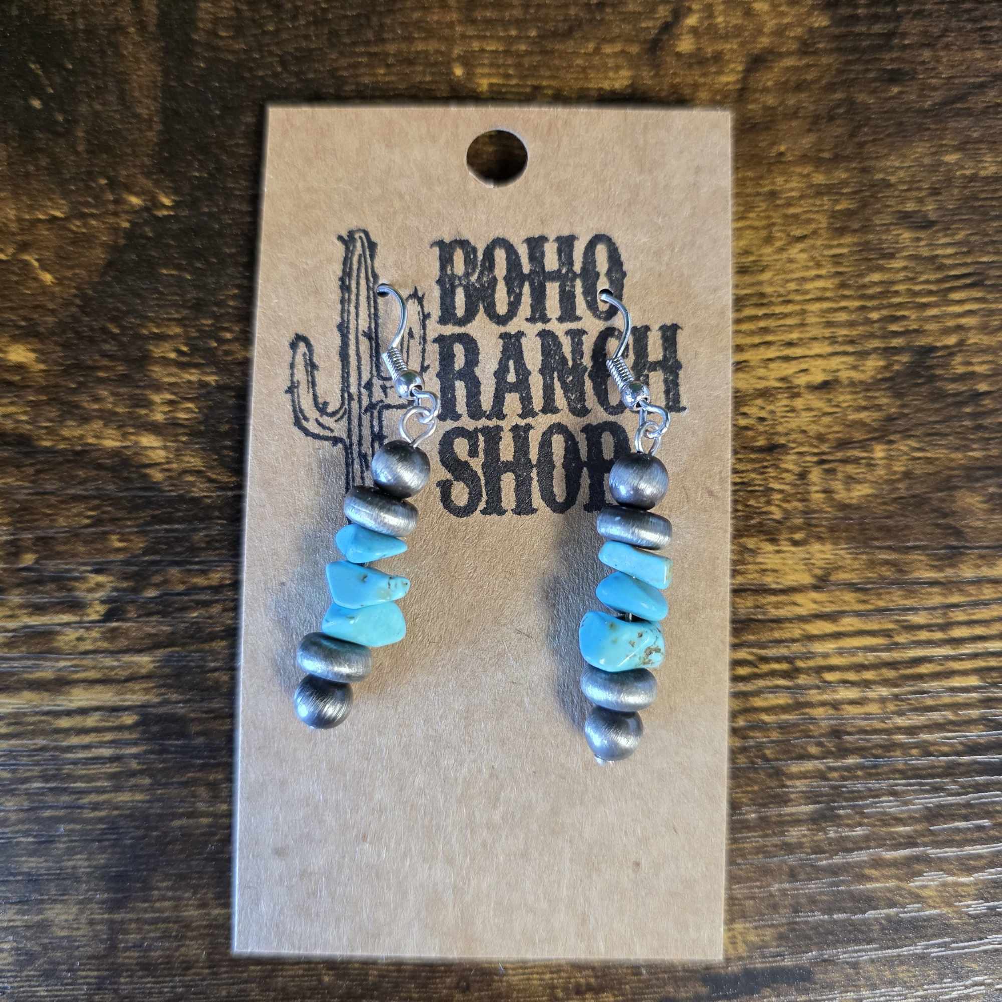 - Burnished Silvertone
- Faux Chip Stone Beads
- Faux Matte Silver Navajo Pearl