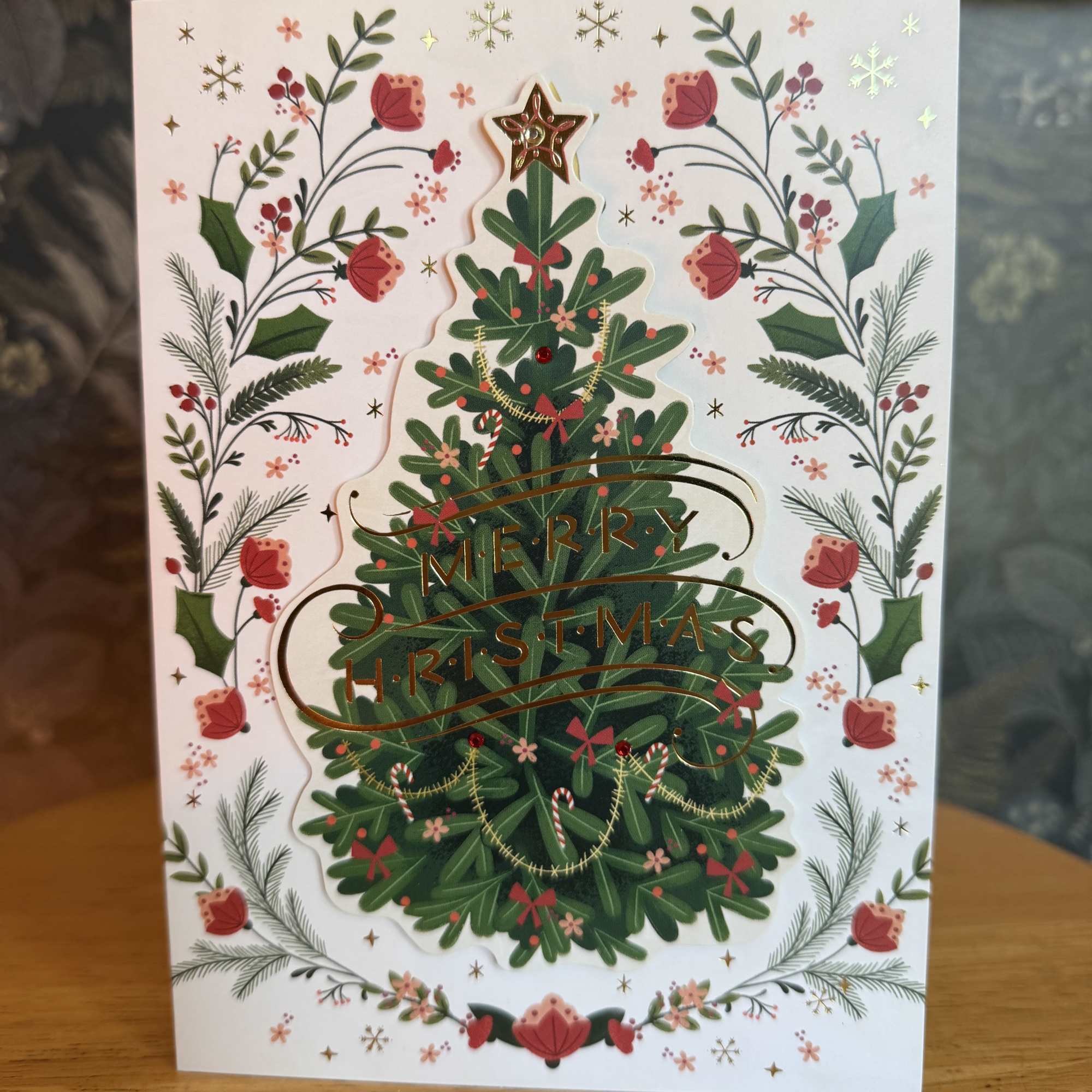 Greeting card perfect for the holidays. 

Outside: &quot;Merry Christmas&quot;
Inside: &quot;And A Happy