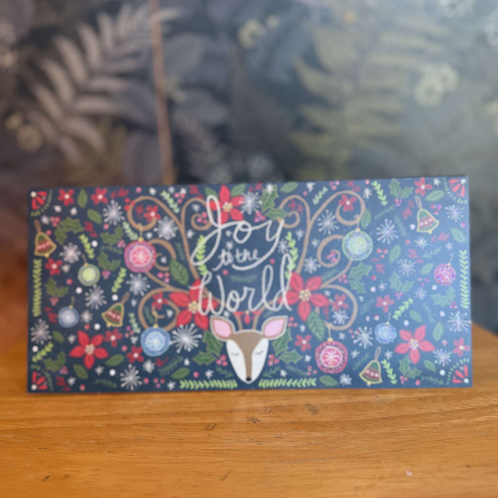 Greeting card perfect for the holidays. 

Outside: &quot;Joy to the World&quot; 
Inside: