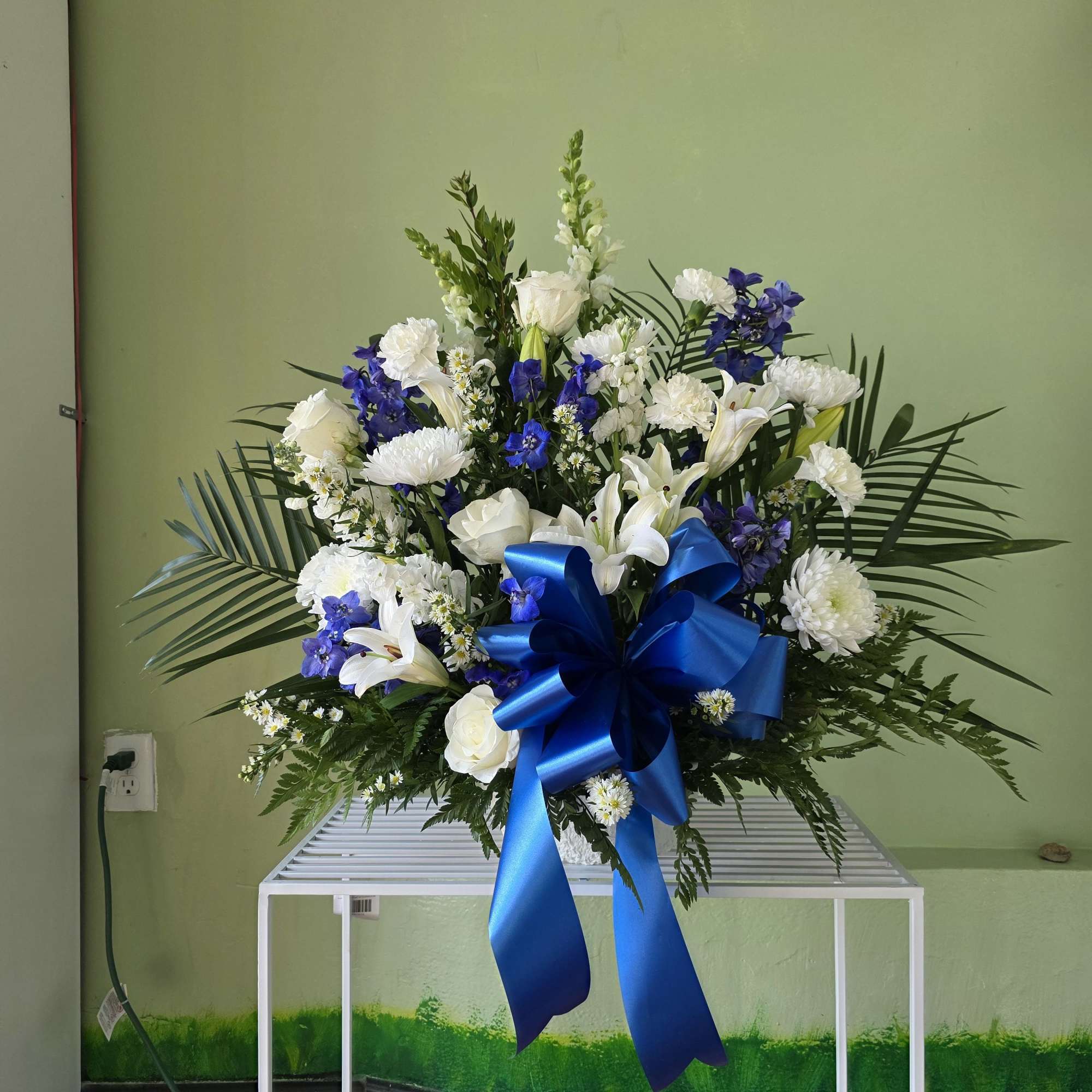 Elegant and serene, the Peaceful Tribute features a timeless blend of white