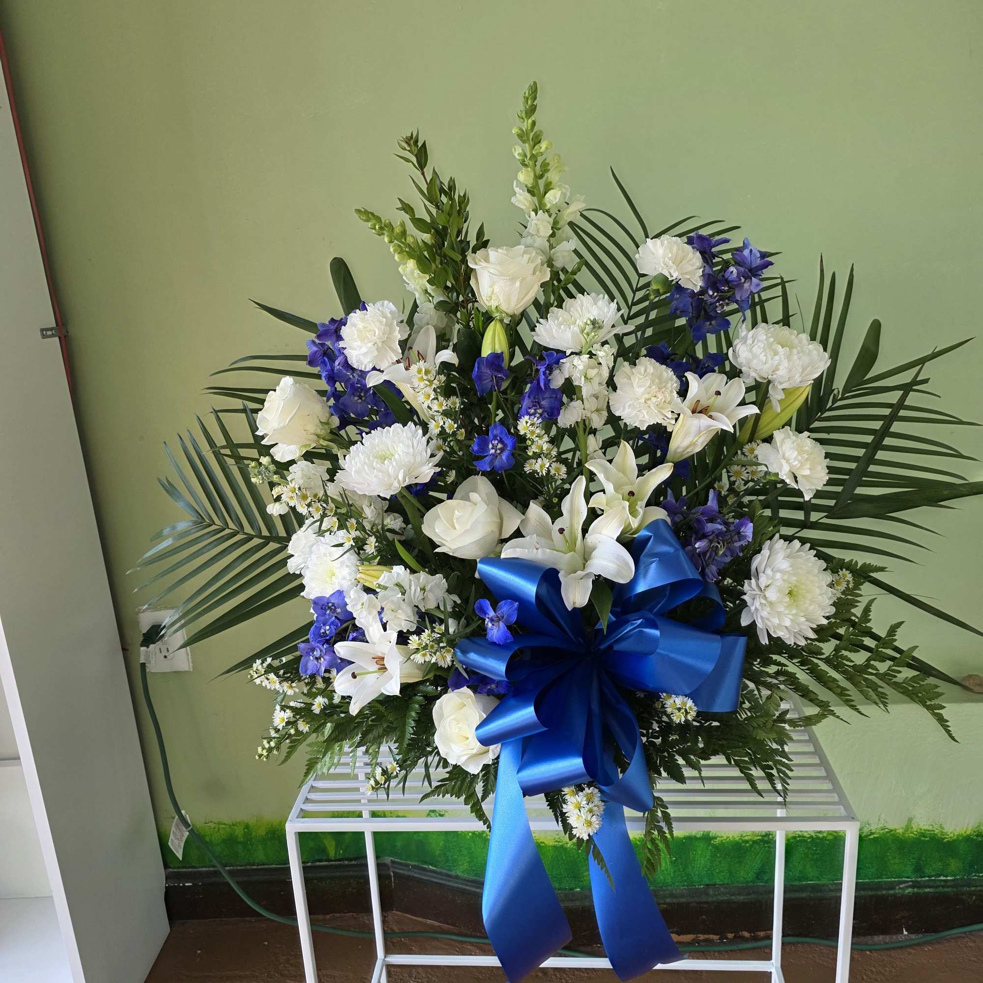 Elegant and serene, the Peaceful Tribute features a timeless blend of white