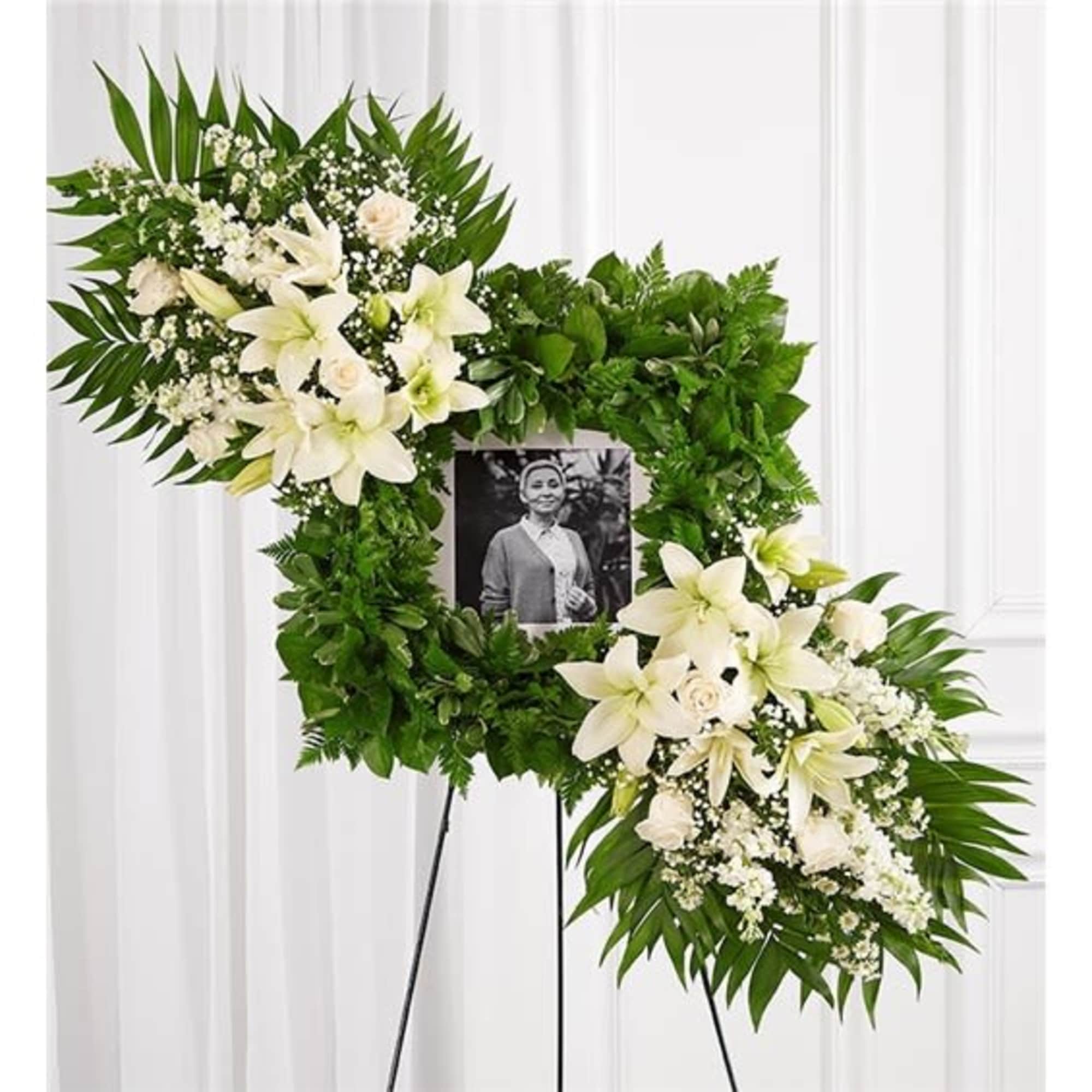 Celebrate the cherished memories you shared with a beautiful floral arrangement. Our