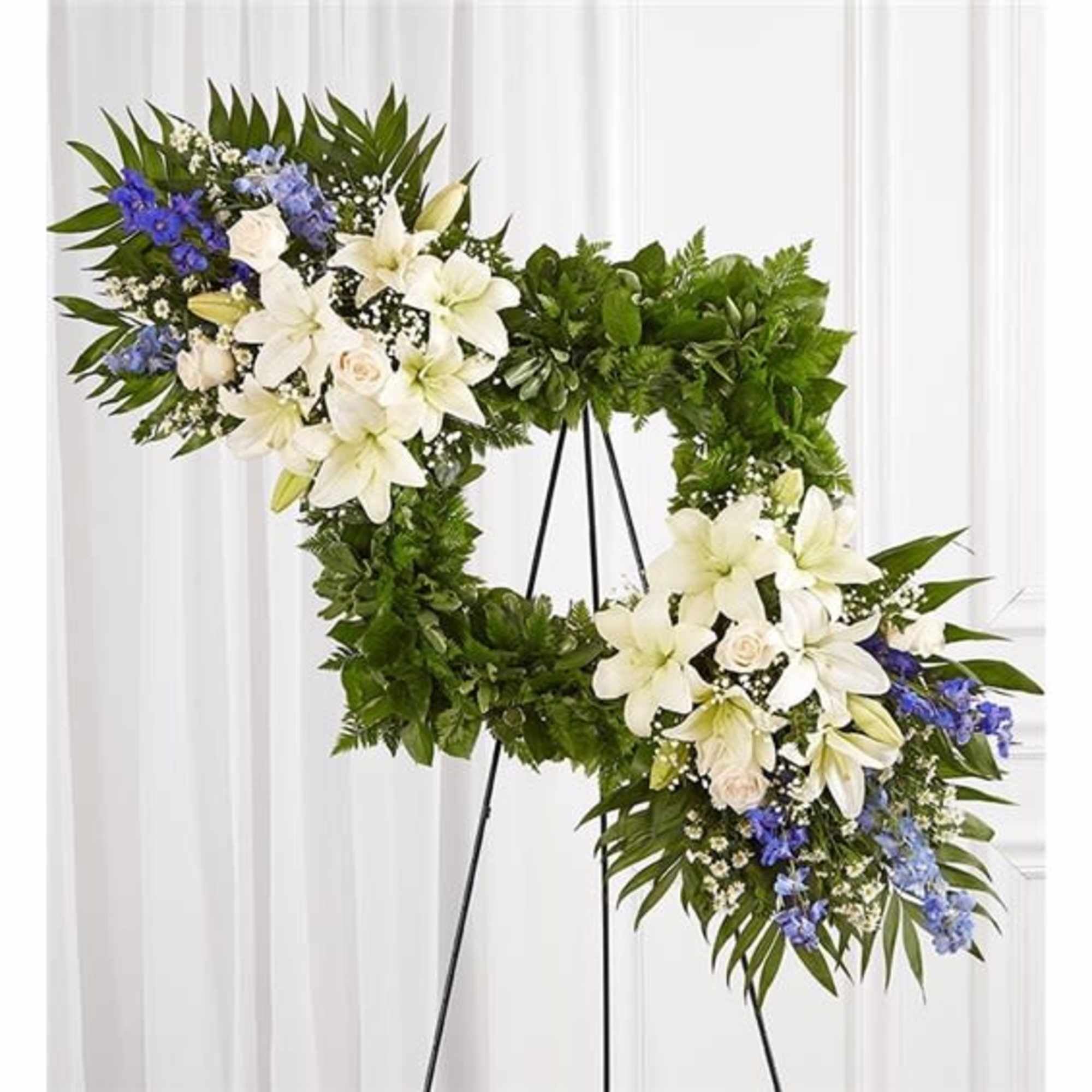 Celebrate the cherished memories you shared with a beautiful floral arrangement. Our