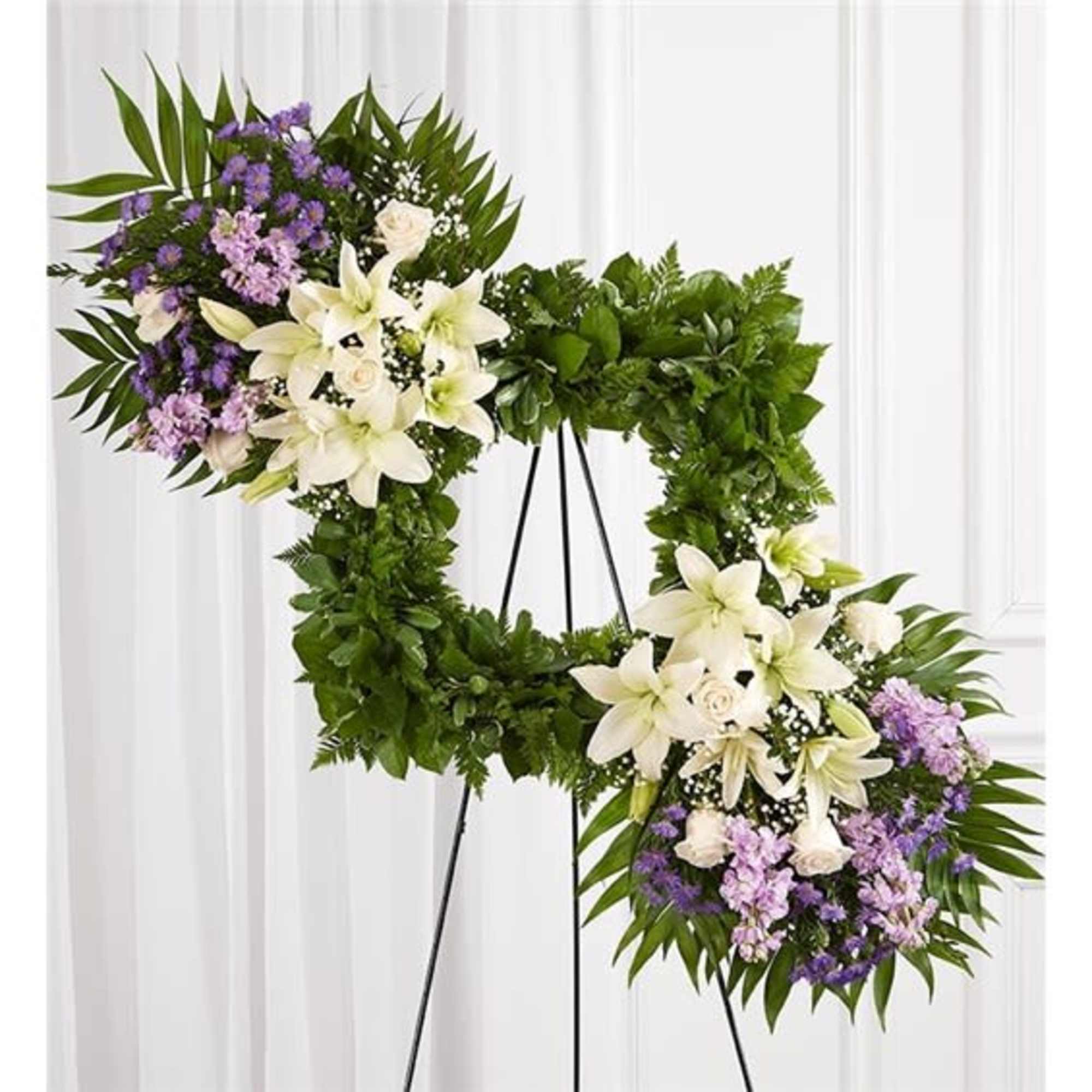 Celebrate the cherished memories you shared with a beautiful floral arrangement. Our