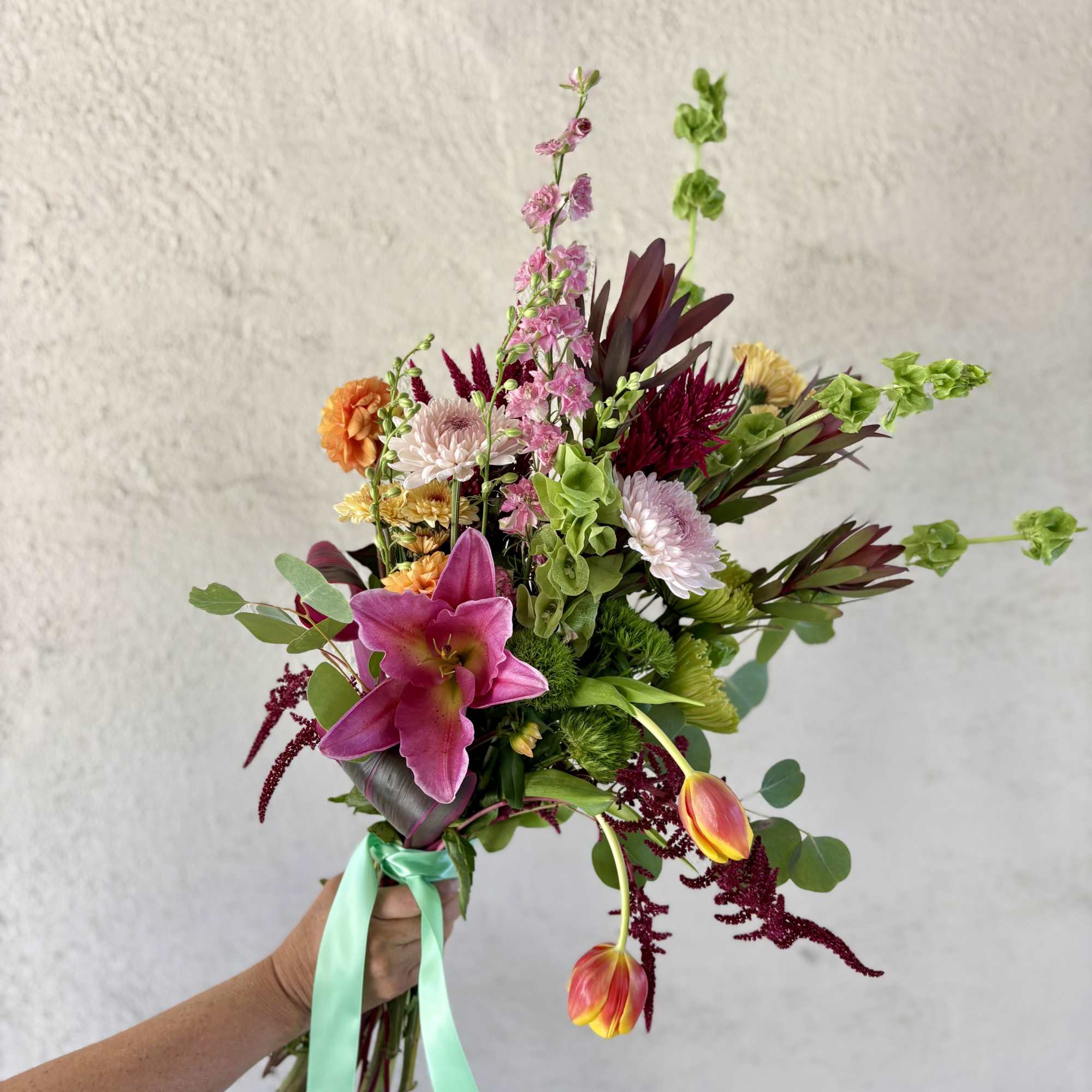This weeks wrap includes pinks, greens, and oranges with Seasonal Dahlias, Amaranths