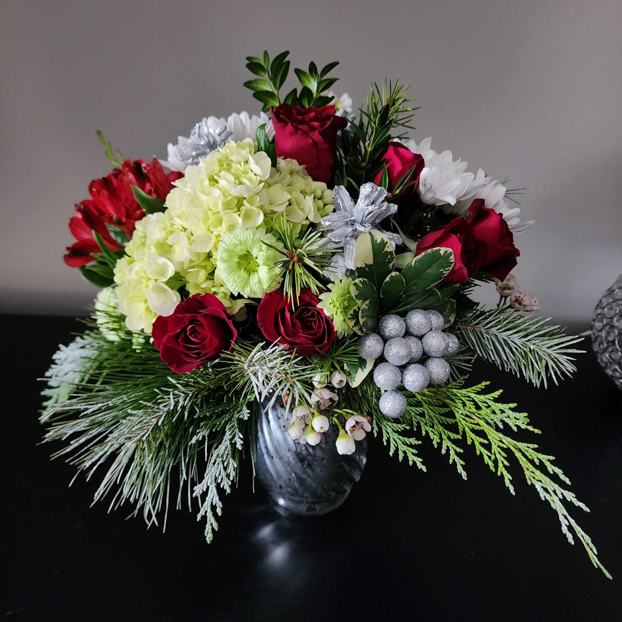 Holiday Shimmer by The Magic Garden Florist

Elevate your seasonal celebrations with Holiday