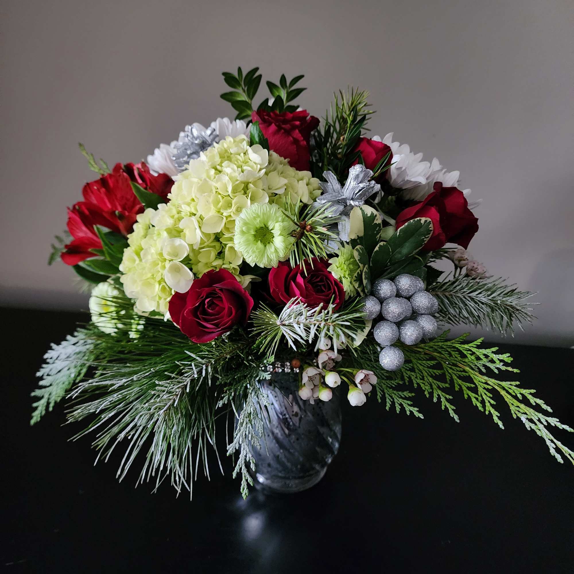 Holiday Shimmer by The Magic Garden Florist

Elevate your seasonal celebrations with Holiday