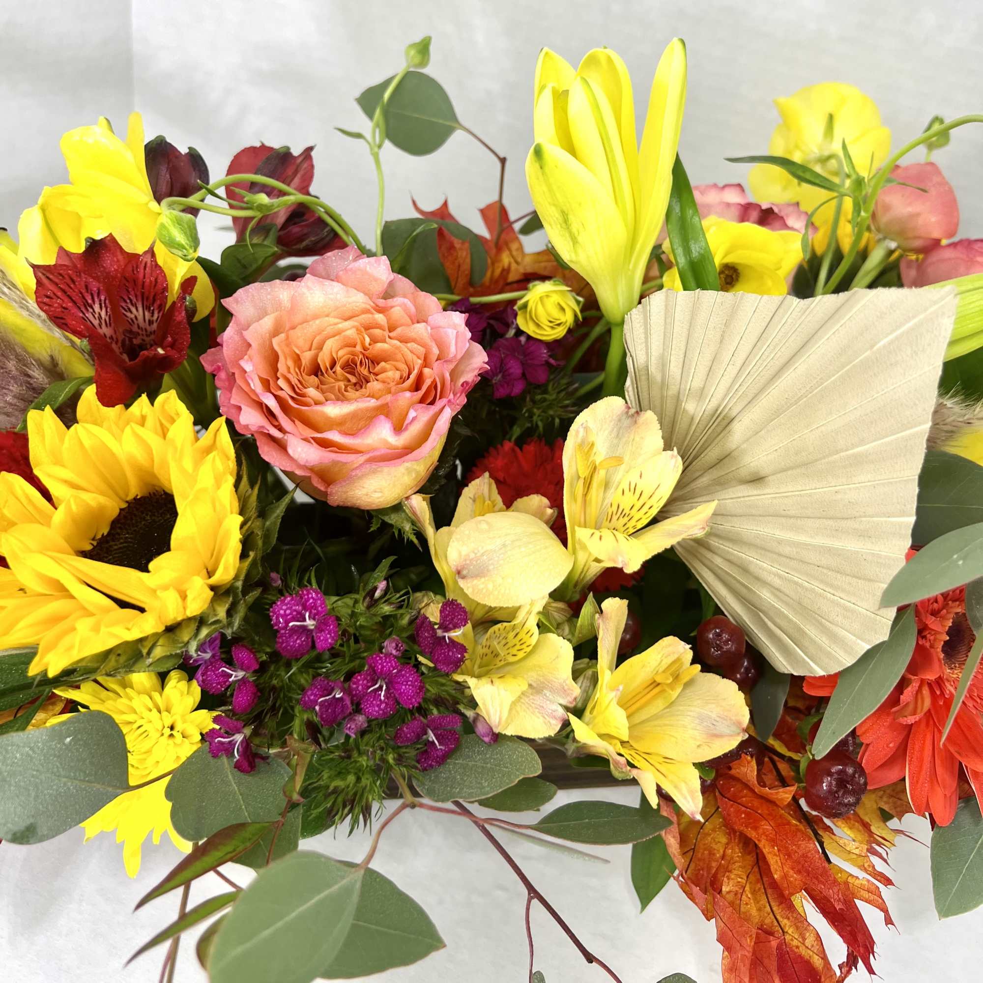 Fall flowers for the modern table in a trendy, dark wooden box.