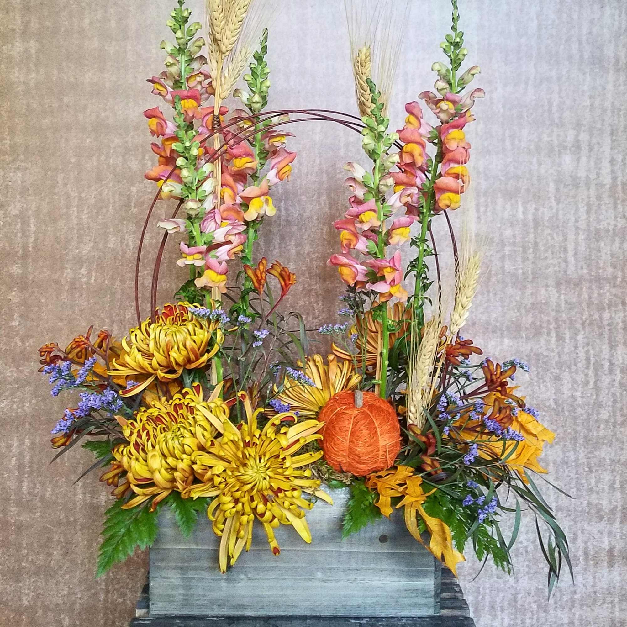Designer&#039;s choice of seasonal cut flowers and accents to include bright and